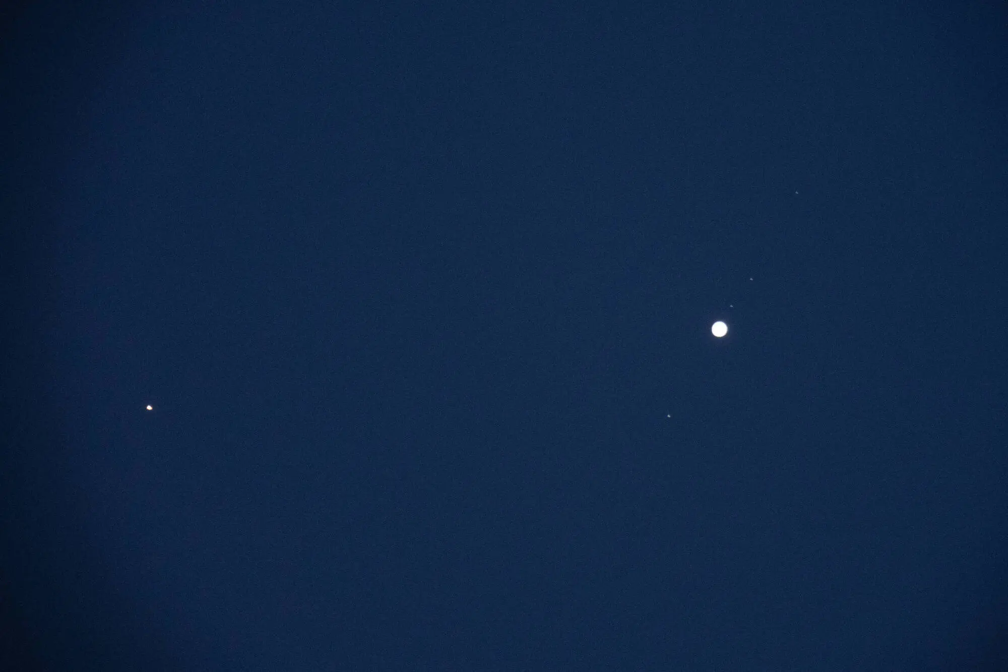 Planets Mars and Jupiter are seen in conjunction through a telescope in the sky above L'Aquila, Italy, on August 15th, 2024. Jupiter satellites, also known as Jupiter "Moons", are visible next to the planet. Mars and Jupiter met on the night between August 14 and 15 in the constellation of Taurus. The Gas Giant and the Red Planet created a spectacular close conjunction perfectly visible to the naked eye. (Photo by Lorenzo Di Cola/NurPhoto via Getty Images)