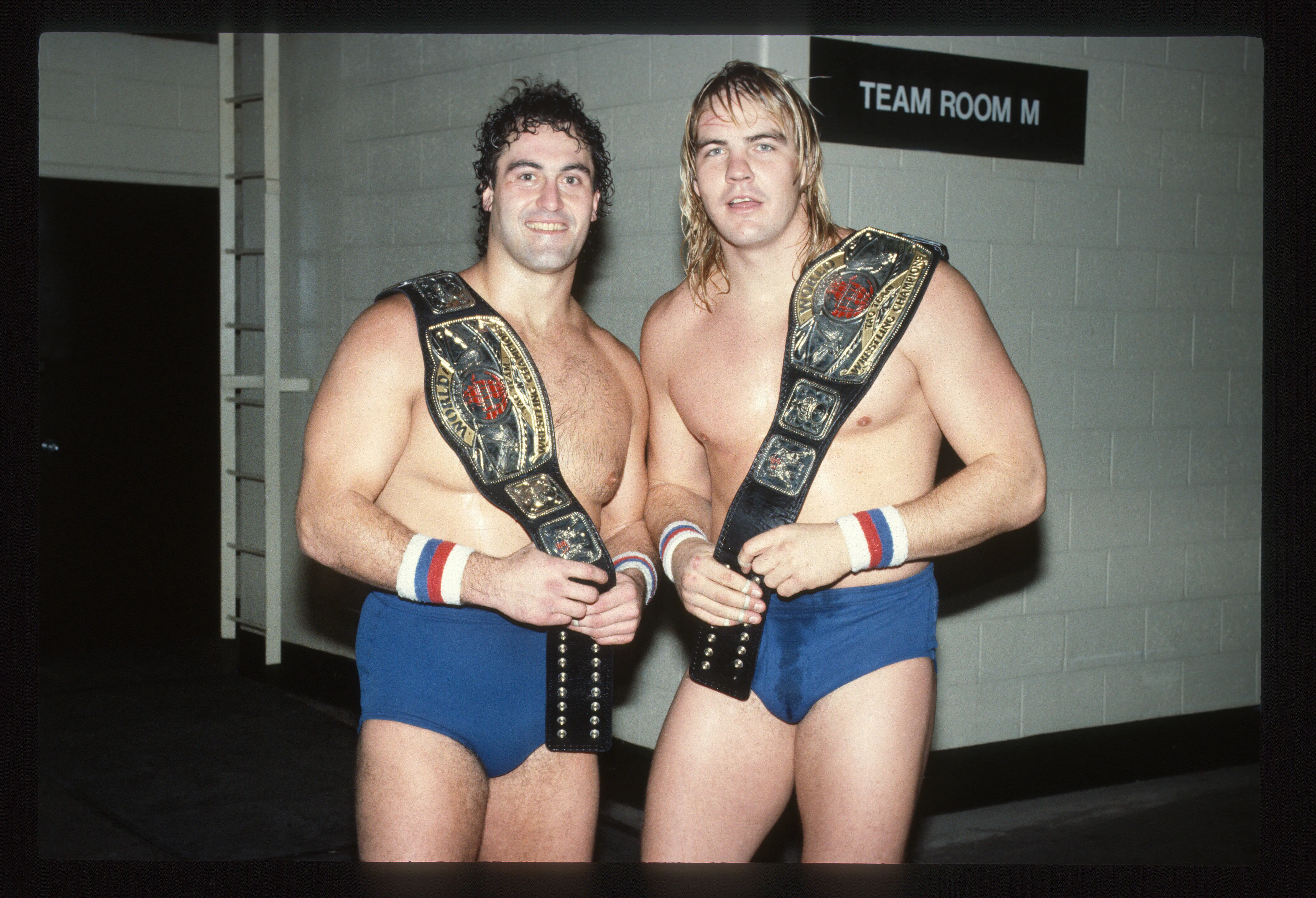 Mike Rotunda and Barry Windham, of US Express, pose backstage on January 21, 1985 (Image via Getty)