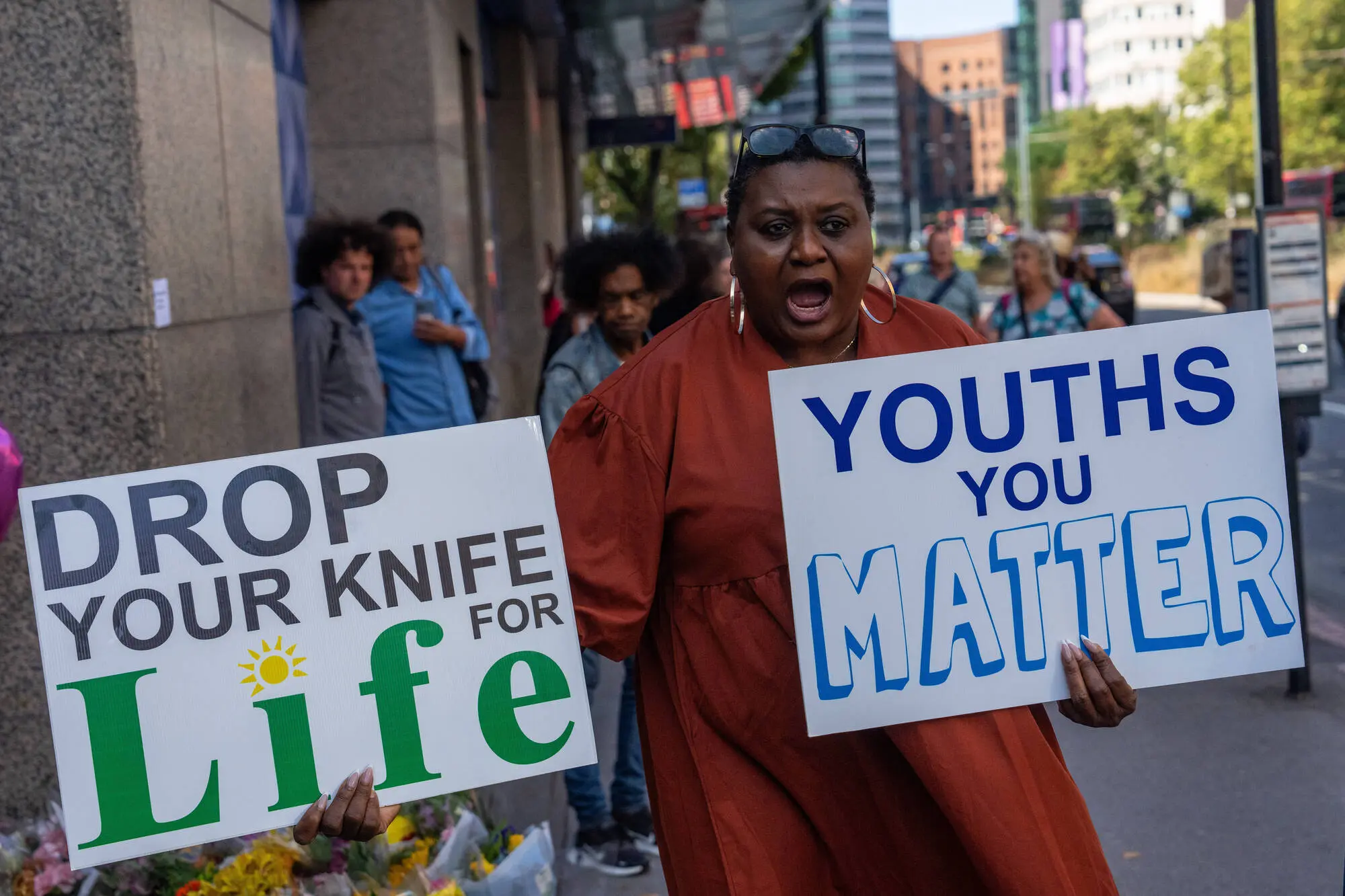 A woman protests against youth violence at the scene of Elianne Andam's murder, on September 29, 2023 in Croydon, England. (Photo by Carl Court/Getty Images)