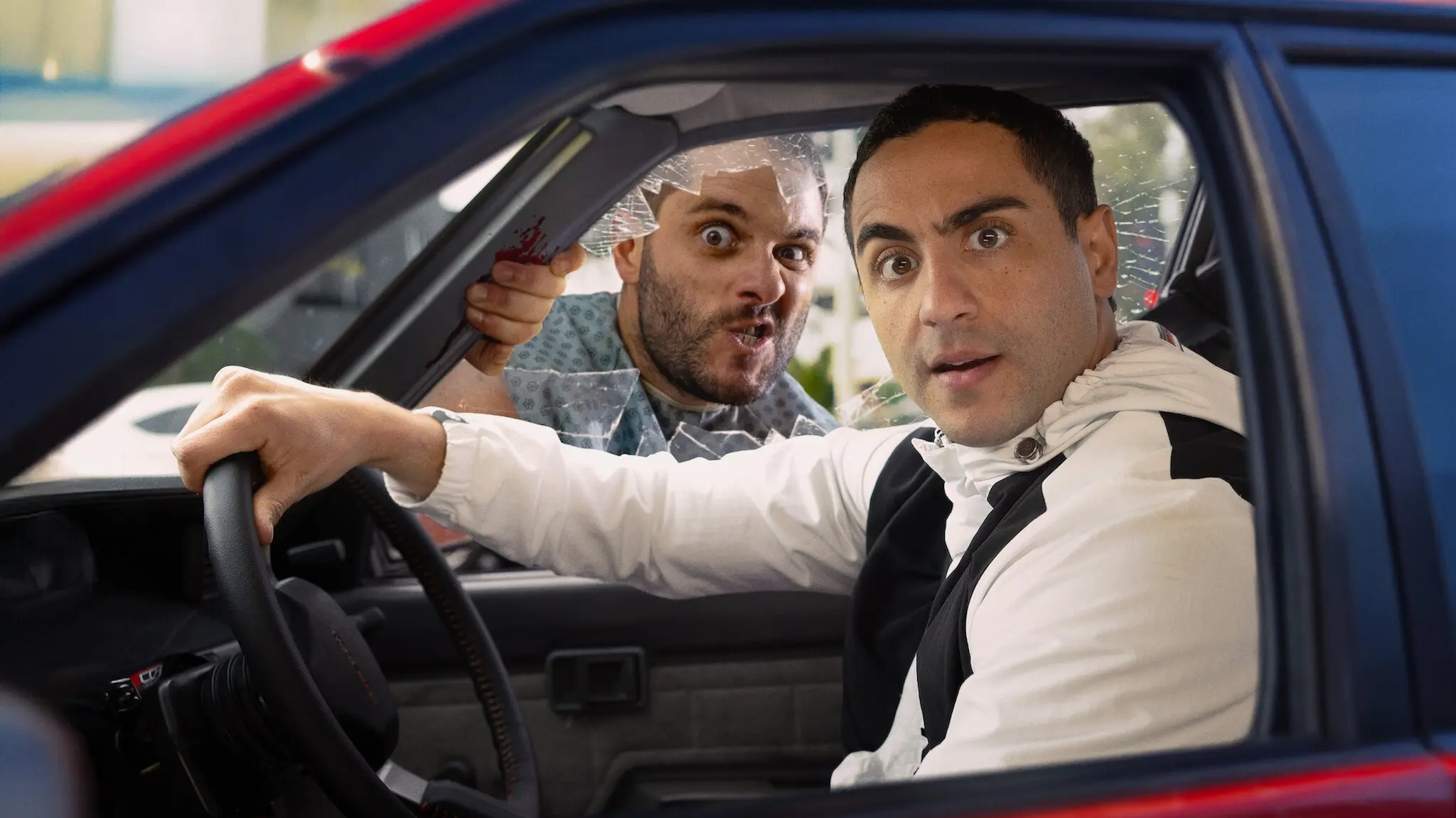 Theodore Saidden as Theo and Nathan Saidden as Johnny and Dad in Son of a Donkey Season 1. (Image via Netflix)