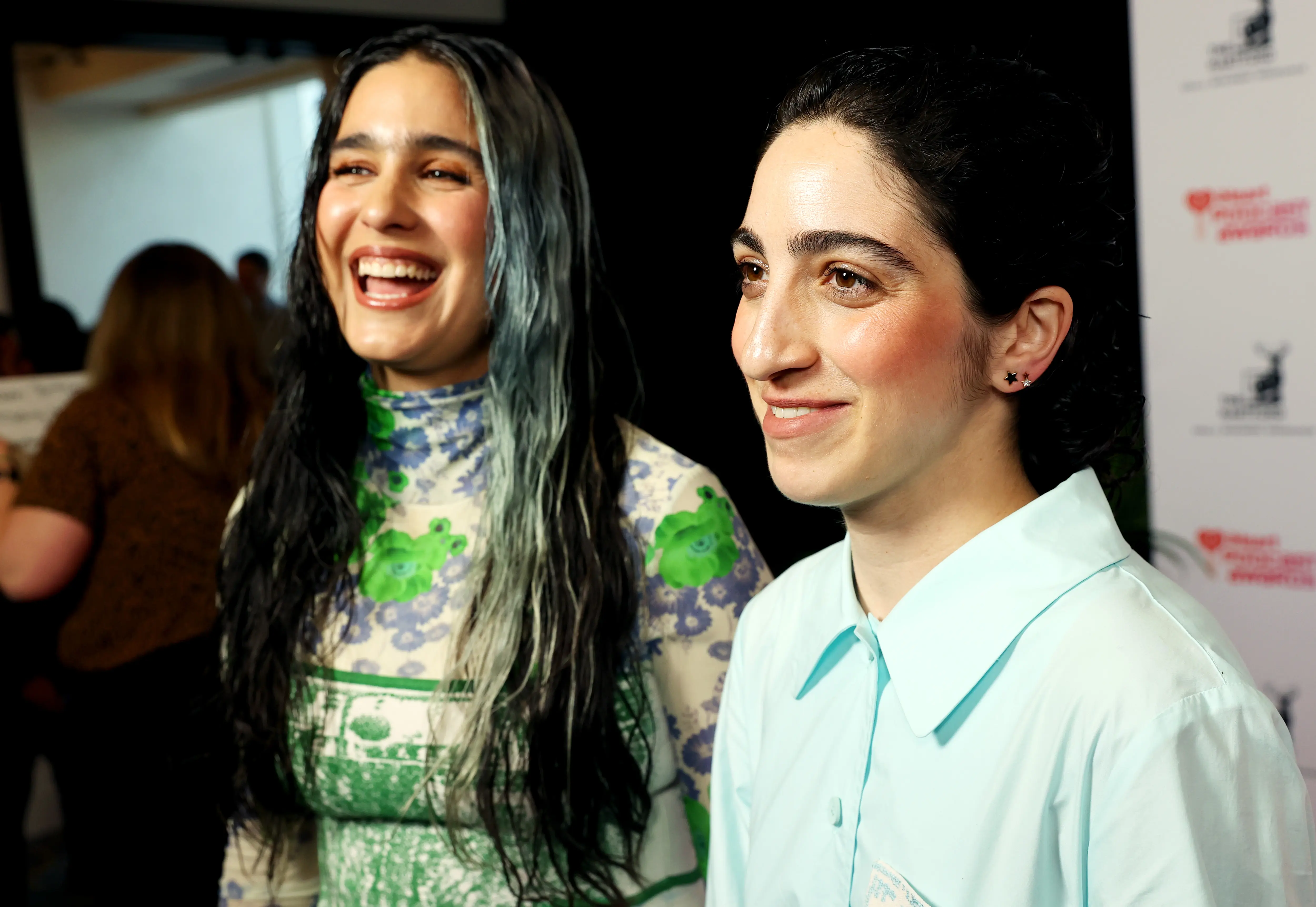Gemeny Hernandez and Emily Estefan attend the 2024 iHeartPodcast Awards presented by The Hartford Live (Image via Getty)