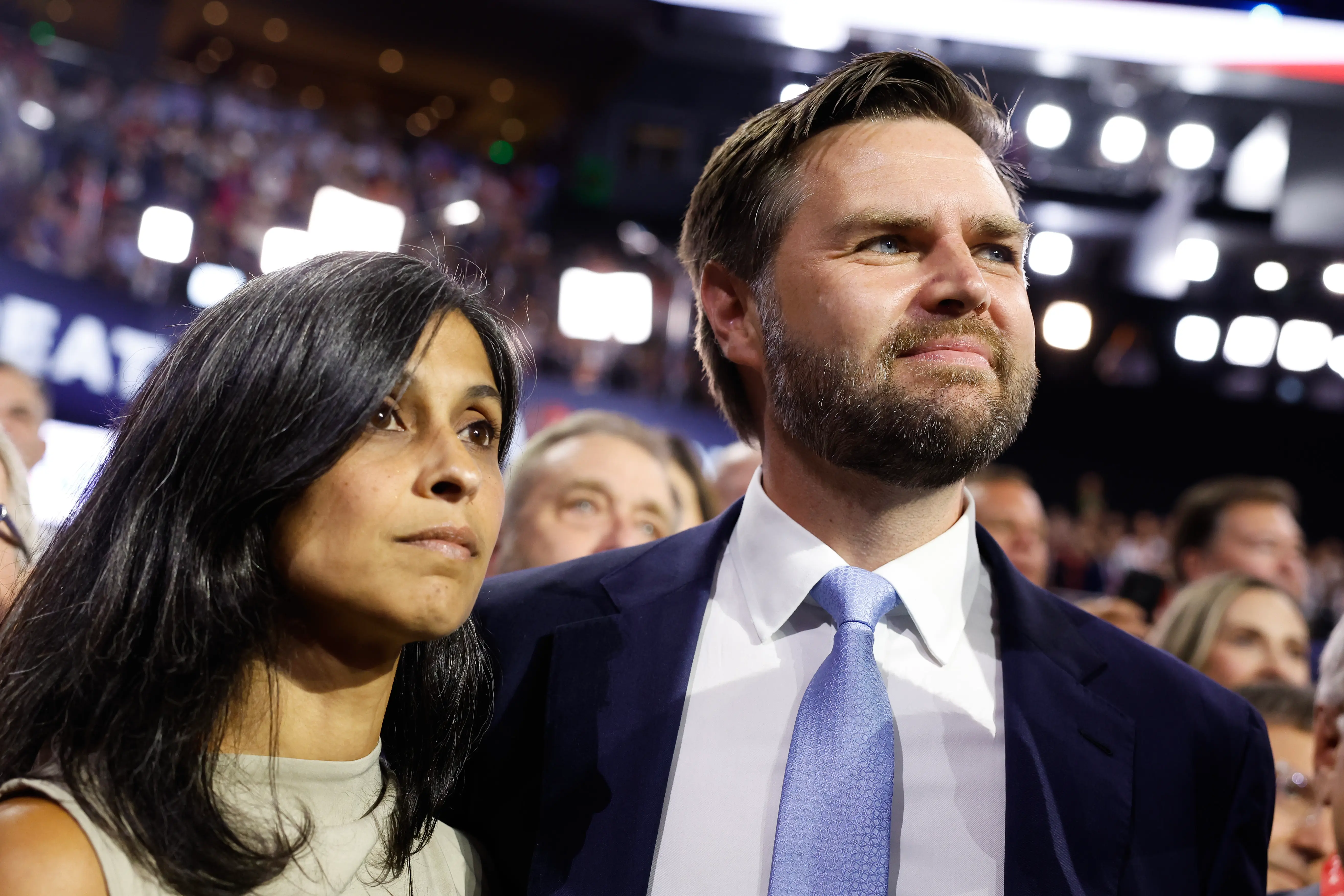 J.D. Vance and  his wife Usha Chilukuri Vance look on as he is nominated for the office of Vice President on the first day of the Republican National Convention at the Fiserv Forum on July 15, 2024 in Milwaukee, Wisconsin. (Photo by Anna Moneymaker/Getty Images)