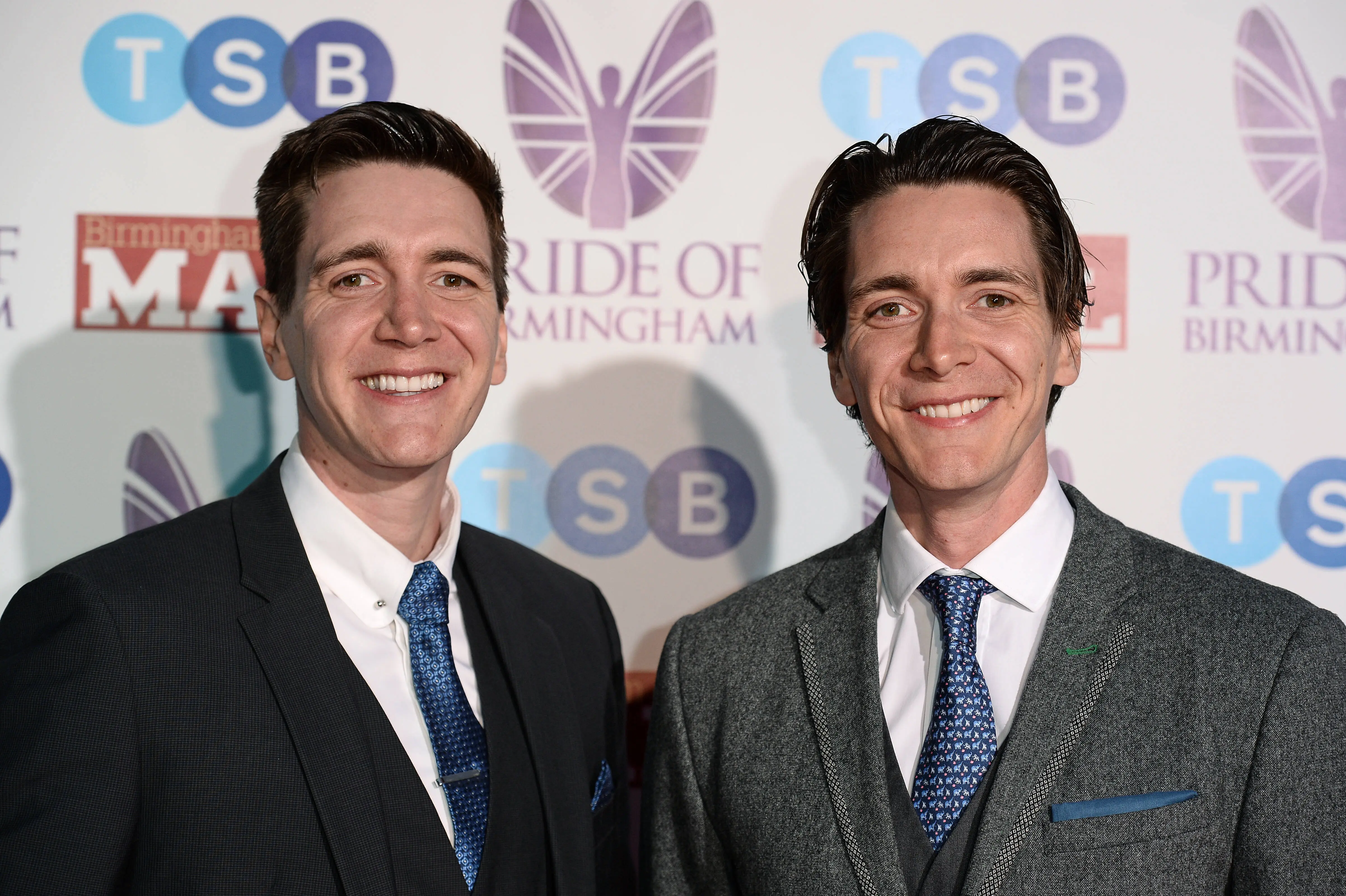 Oliver Phelps and James Phelps (Image via Getty)