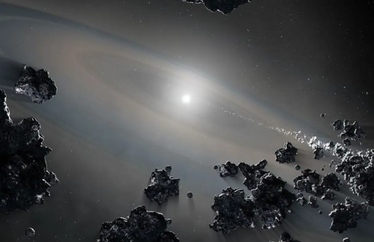 Illustration of a white dwarf star siphoning off debris from shattered objects in a planetary system (Image via NASA)