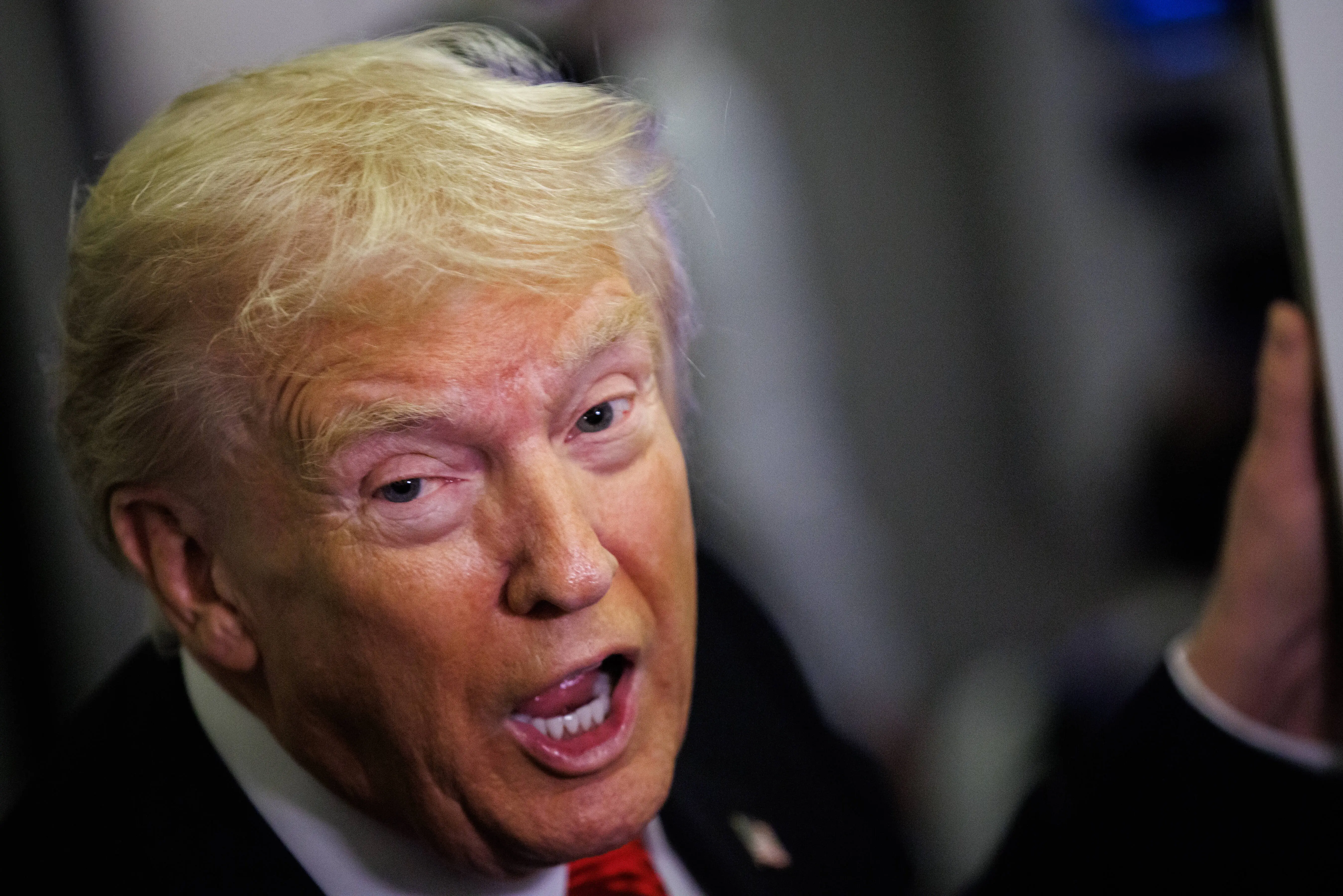 WEST PALM BEACH, FLORIDA - NOVEMBER 02: U.S. President Donald Trump speaks to reporters aboard Air Force One en route to the White House on November 2, 2025 after taking off from Palm Beach International Airport in West Palm Beach, Florida. Trump spent the weekend at his Mar-A-Lago estate in Palm Beach, Florida. (Photo by Samuel Corum/Getty Images)