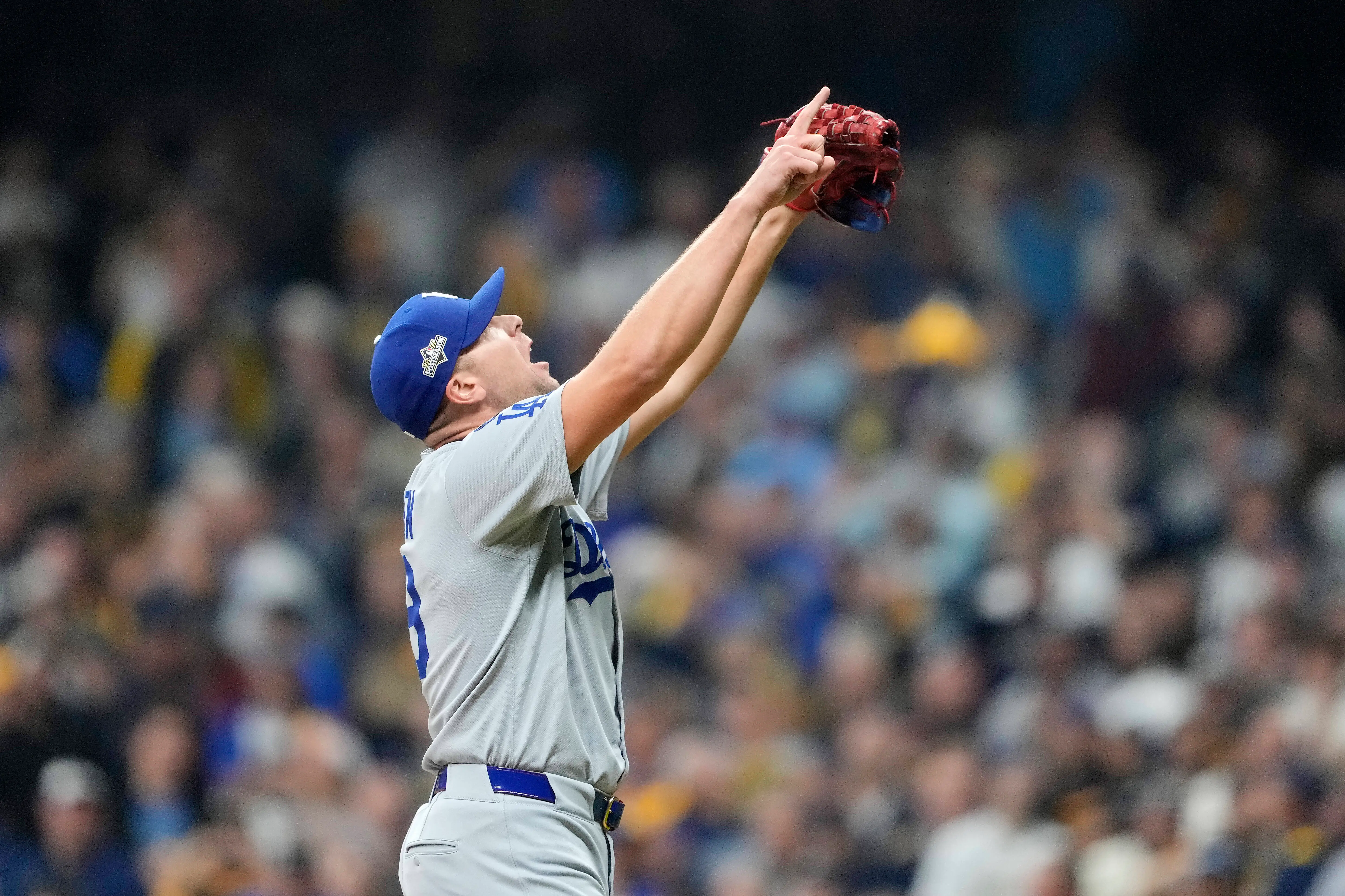 MILWAUKEE, WISCONSIN - OCTOBER 13: Blake Treinen #49 of the Los Angeles Dodgers celebrates after beating the Milwaukee Brewers 2-1 in game one of the National League Championship Series at American Family Field on October 13, 2025 in Milwaukee, Wisconsin. (Photo by Patrick McDermott/Getty Images)