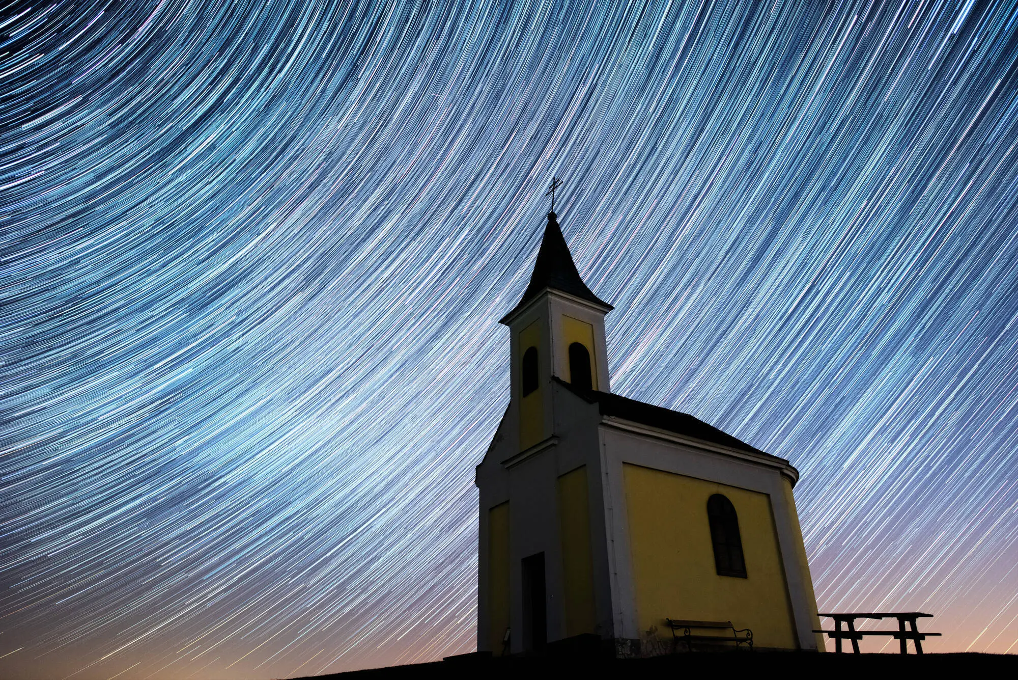 NIEDERHOLLABRUNN, AUSTRIA - APRIL 21: (EDITORS NOTE: Multiple exposures were combined to produce this image.) Startrails are seen during the Lyrids meteor shower over Michaelskapelle on April 20, 2020 in Niederhollabrunn, Austria. The clear skies created by the New Moon coincide with the Lyrid meteor shower, an annual display caused by the Earth passing through a cloud of debris from a comet called C/186 Thatcher. (Photo by Thomas Kronsteiner/Getty Images)