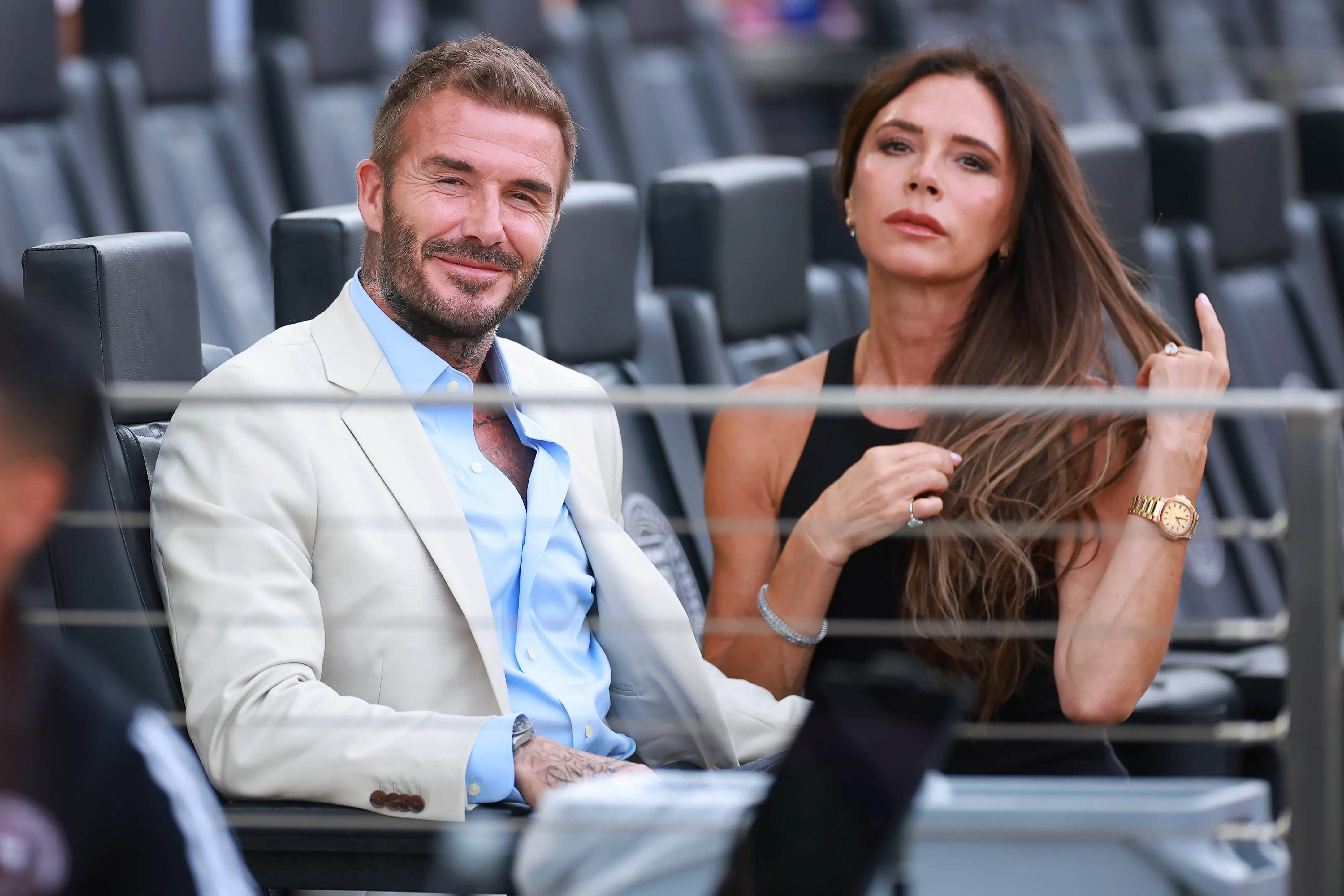 FORT LAUDERDALE, FLORIDA - JULY 25: (L-R) Co-owner David Beckham of Inter Miami CF and wife Victoria Beckham react prior to the Leagues Cup 2023 match between Inter Miami CF and Atlanta United at DRV PNK Stadium on July 25, 2023 in Fort Lauderdale, Florida. (Photo by Hector Vivas/Getty Images)