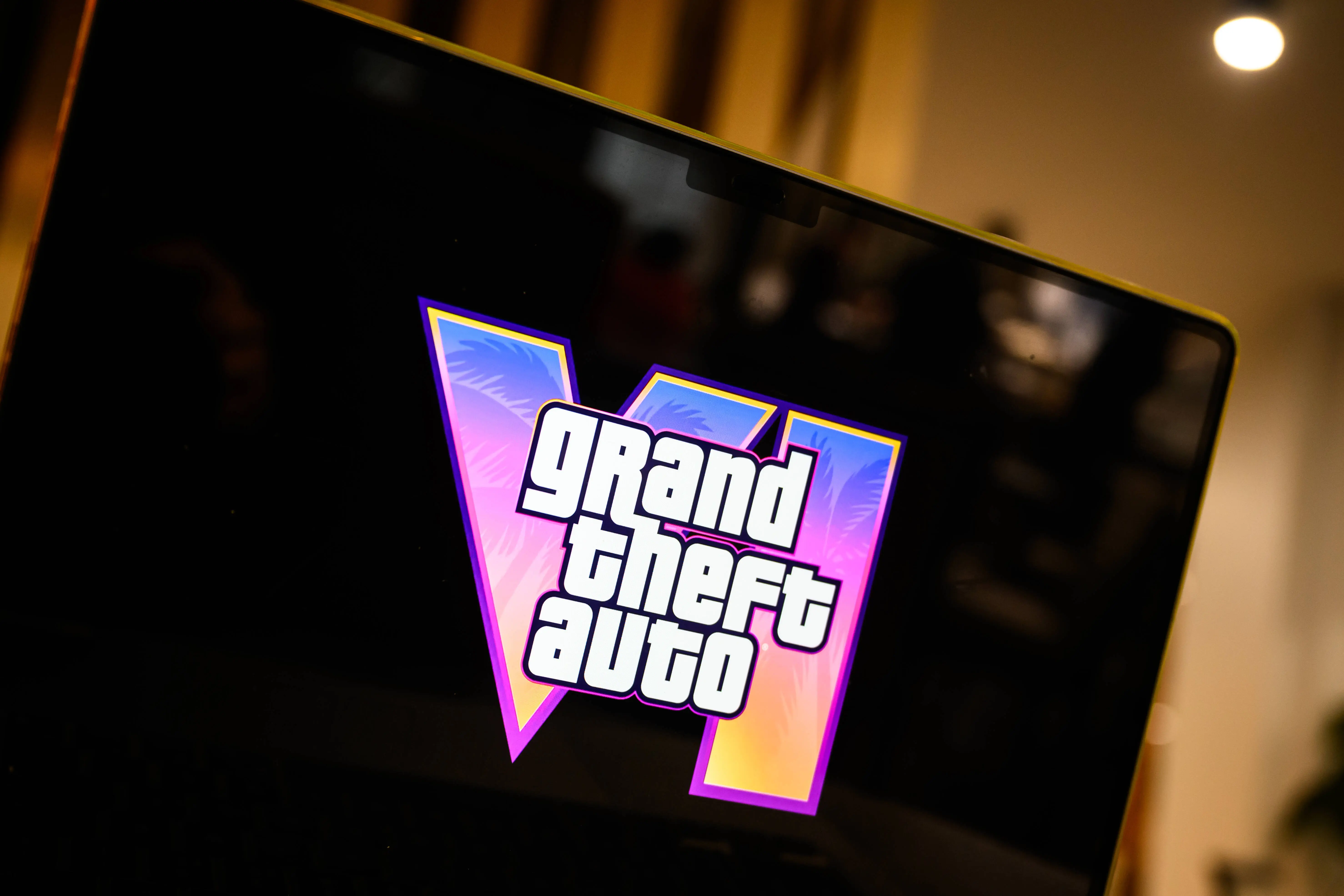 LONDON, ENGLAND - DECEMBER 05: In this photo illustration, the trailer for the "Grand Theft Auto 6" console game is seen on a laptop screen on December 05, 2023 in London, England. After a low resolution version was leaked online, the trailer was released early and had gained over 62 million view within 13 hours. The 90-second teaser confirmed the game will be set in Miami-inspired Vice City and star a female protagonist for the first time since the 1990s. Grand Theft Auto 5 has sold over 190 million copies since its launch in 2013. (Photo by Leon Neal/Getty Images)
