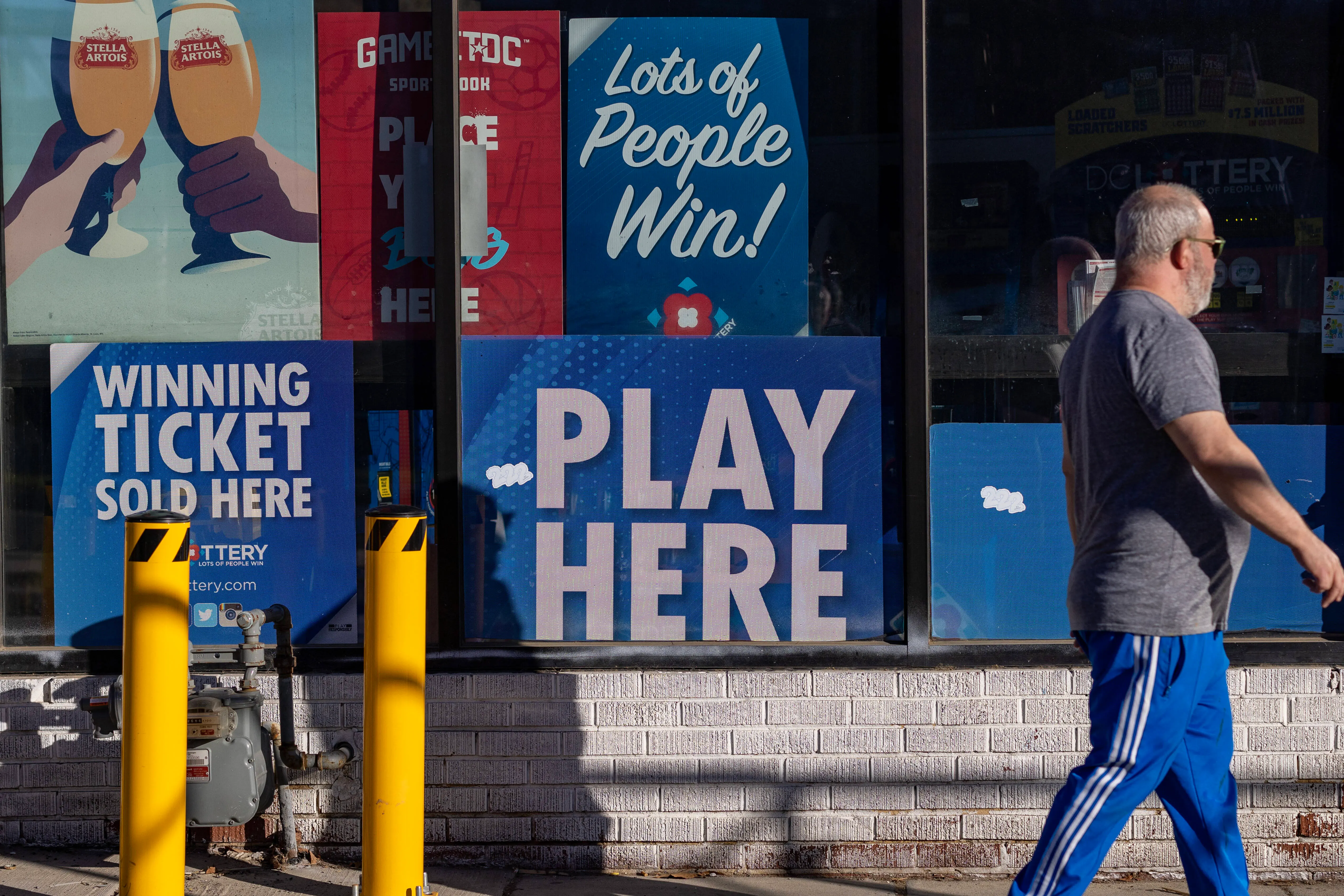 WASHINGTON, DC - NOVEMBER 07: Powerball tickets are for sale on November 07, 2022 in Washington, DC. The estimated Powerball jackpot for the November 7th drawing has increased to  $1.9 billion, with an estimated lump sum payout of $929.1 million. (Photo by Tasos Katopodis/Getty Images)
