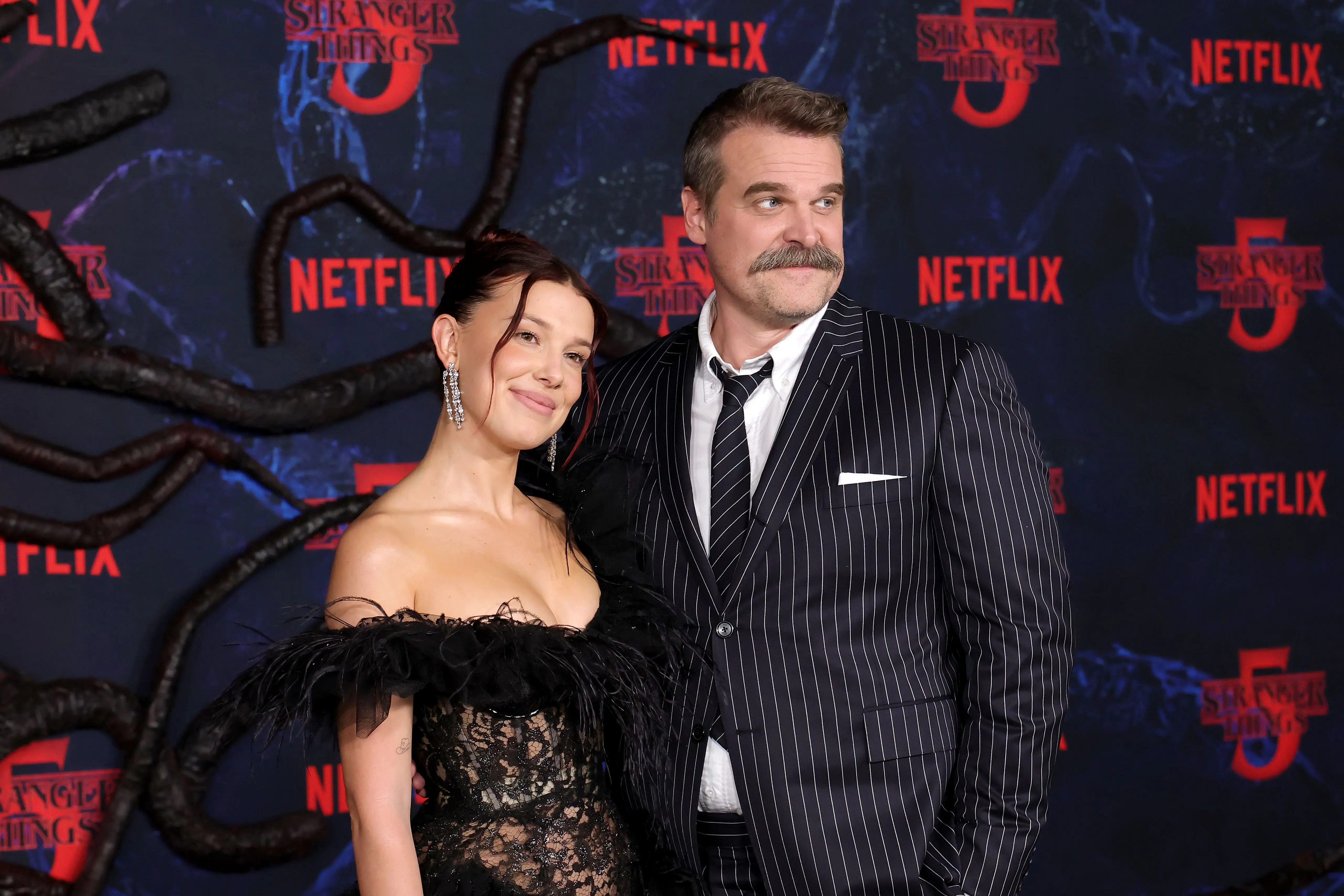 Millie Bobby Brown and David Harbour Reunite at ‘Stranger Things’ Finale Premiere (Photo by Kevin Winter/Getty Images)