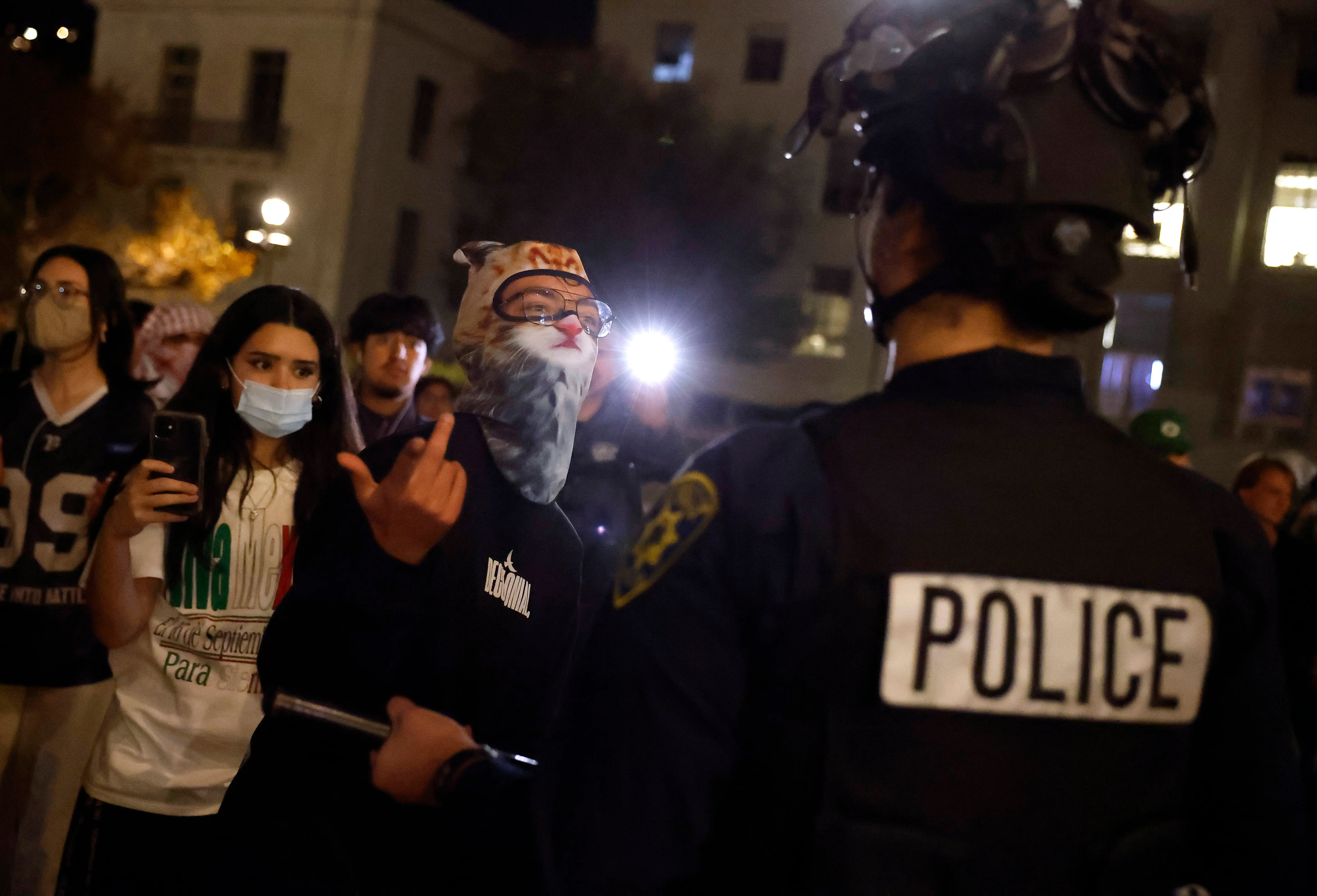 Protesters confront University of California police outside of a Turning Point USA event at the University of California, Berkeley (UC Berkeley) on November 10, 2025 in Berkeley, California. (Photo by Justin Sullivan/Getty Images)