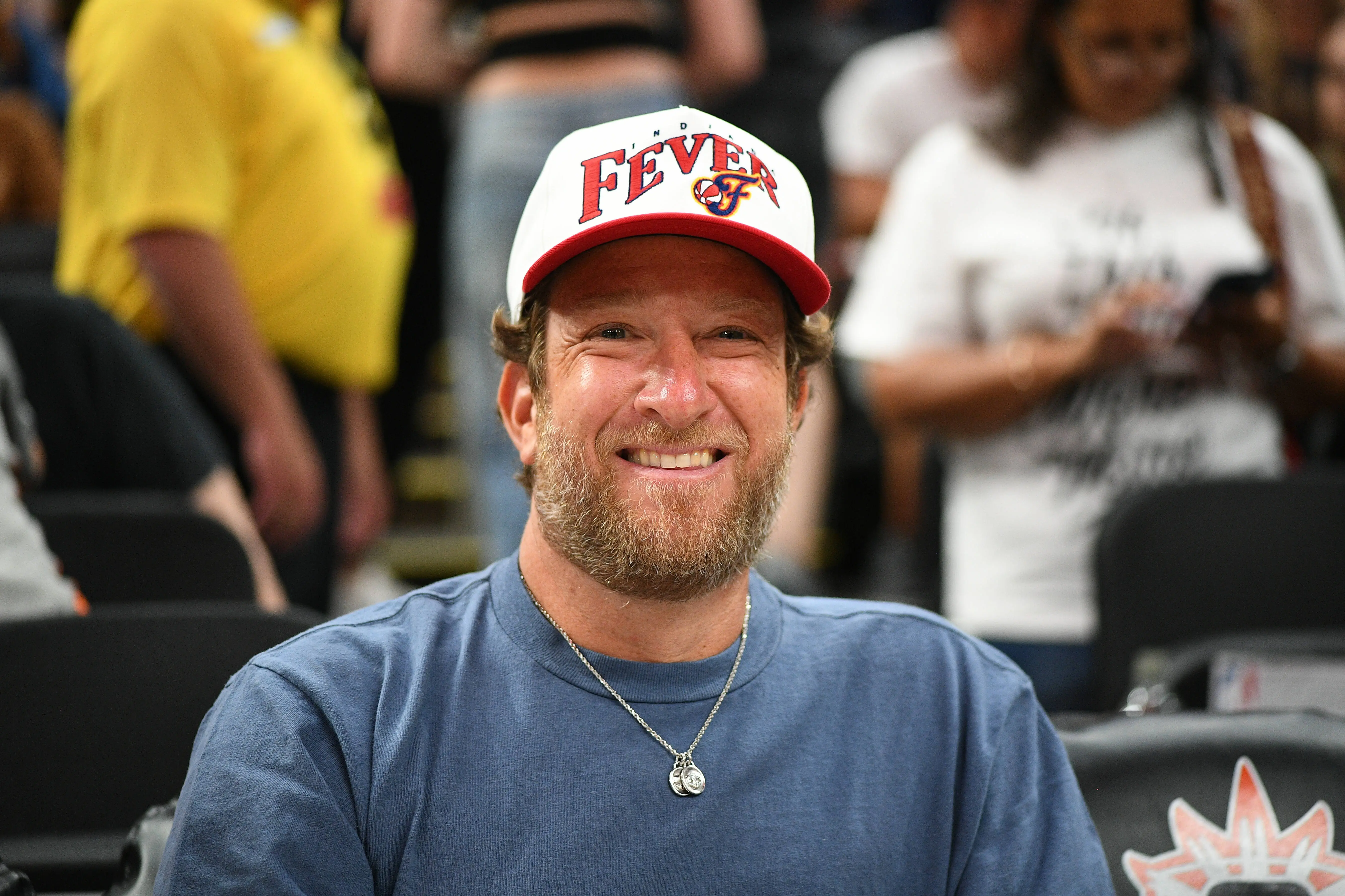 Dave Portnoy, wearing an Indiana Fever hat, poses for a photo while attending a WNBA game between the Indiana Fever and the Connecticut Sun on July 15, 2025, at TD Garden in Boston, MA. (Photo by Erica Denhoff/Icon Sportswire via Getty Images)