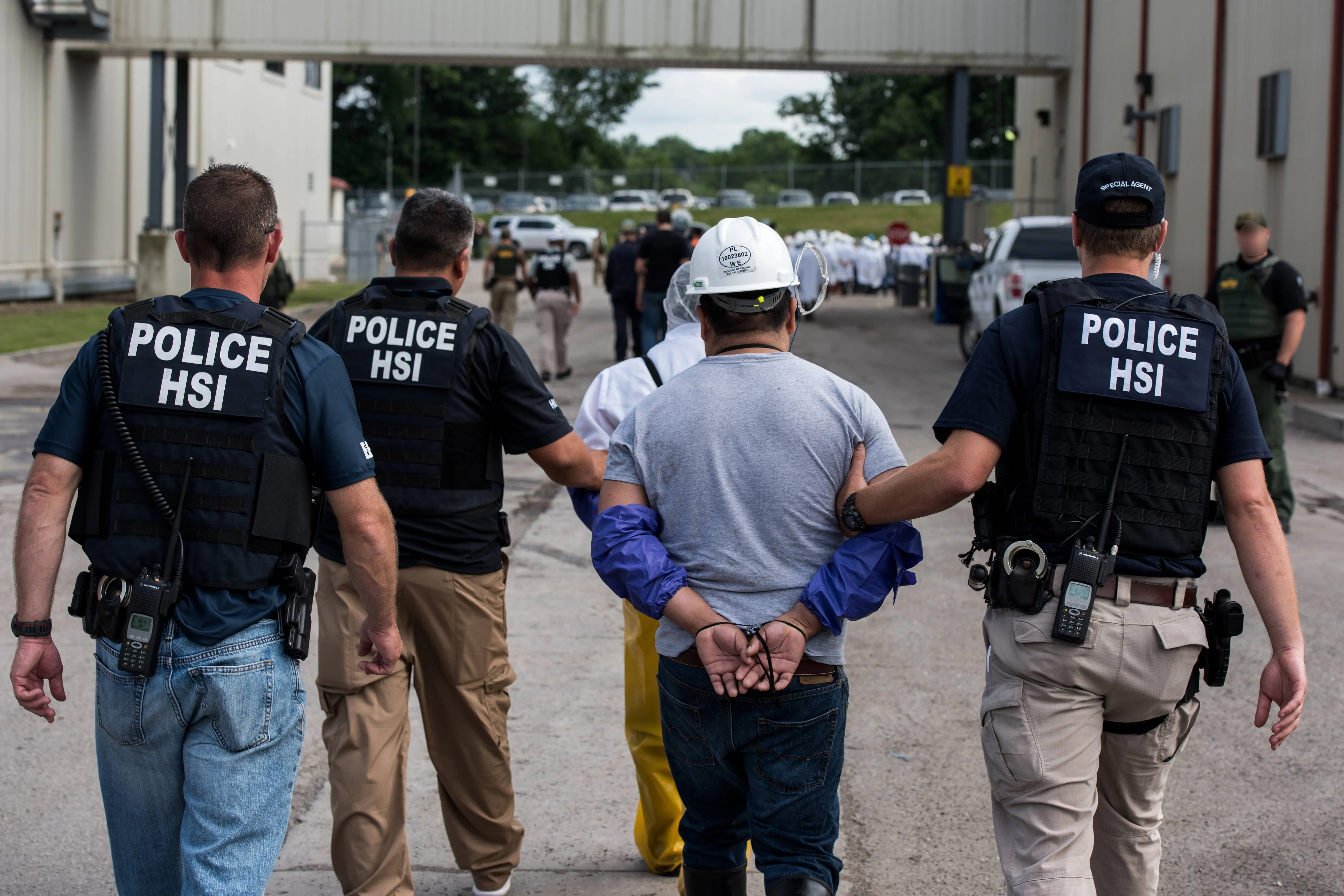 US Immigration and Customs Enforcement's (ICE) Homeland Security Investigations (HSI) special agents arrested alleged immigration violators at Fresh Mark, Salem, June 19, 2018. Image courtesy ICE ICE / U.S. Immigration and Customs Enforcement. (Photo by Smith Collection/Gado/Getty Images)