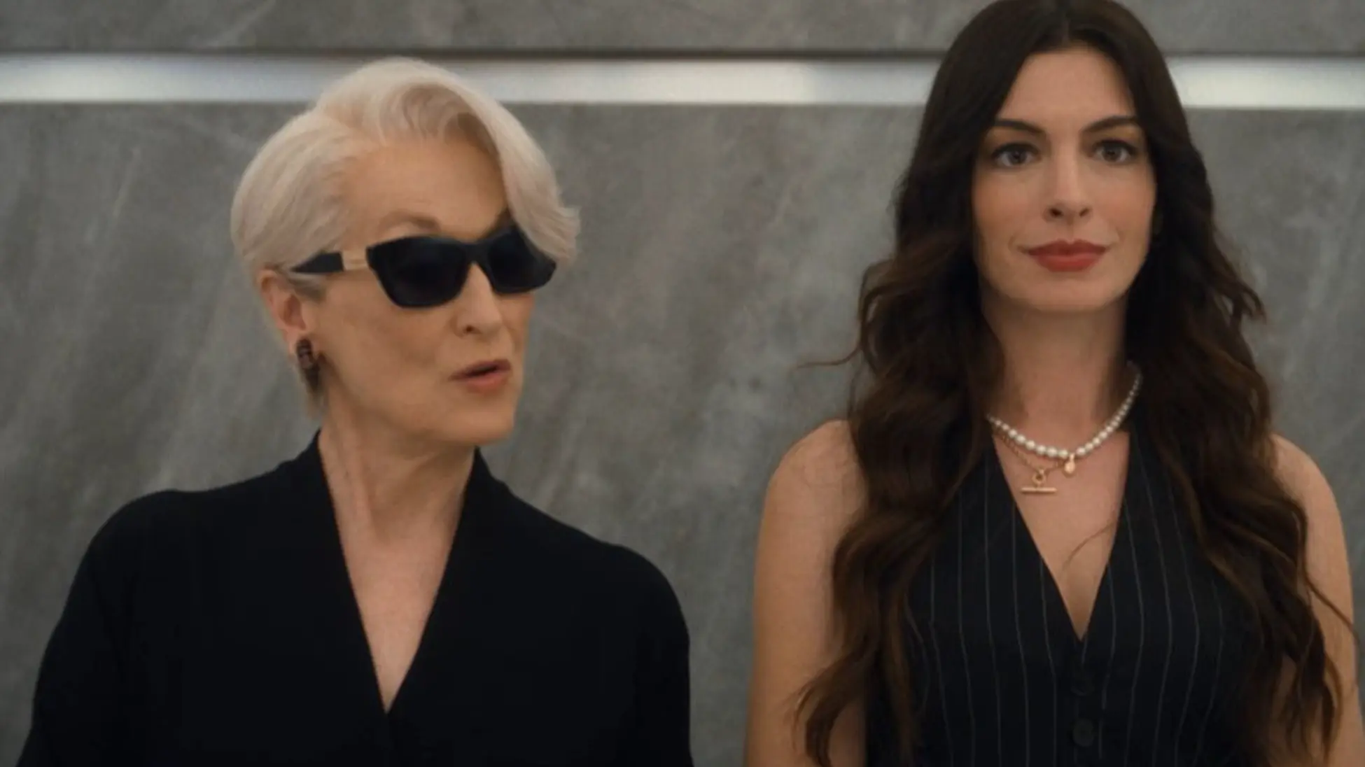 Meryl Streep as Miranda Priestly and Anne Hathaway as Andy Sachs share an elevator moment in The Devil Wears Prada 2 trailer, image via YouTube/@20th Century Studios