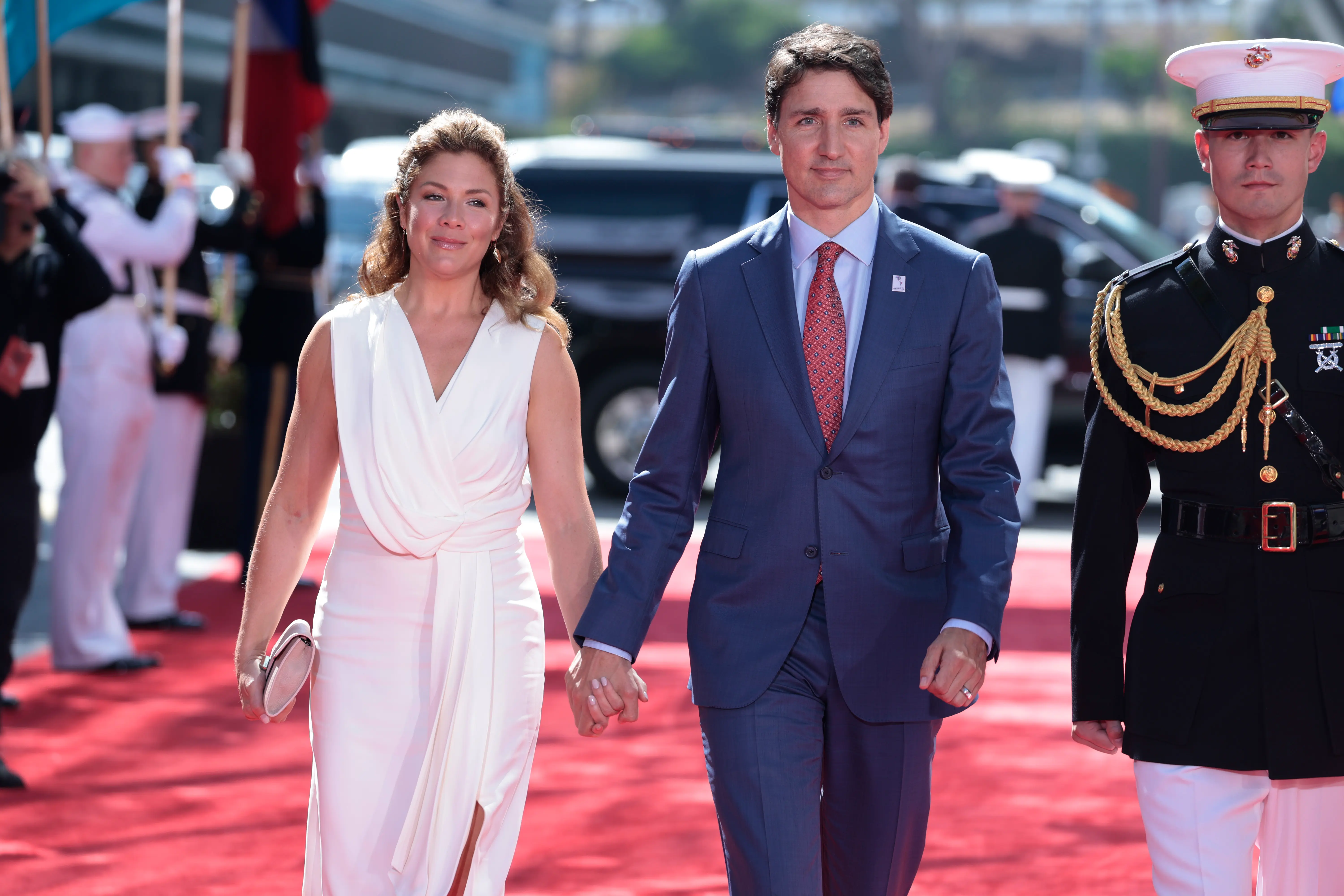 LOS ANGELES, CALIFORNIA - JUNE 08: Prime Minister Justin Trudeau of Canada arrives alongside his wife Sophie Gregoire Trudeau to the Microsoft Theater for the opening ceremonies of the IX Summit of the Americas on June 08, 2022 in Los Angeles, California.  Leaders from North, Central and South America will travel to Los Angeles for the summit to discuss issues such as trade and migration. The United States is hosting the summit for the first time since 1994, when it took place in Miami. (Photo by Anna Moneymaker/Getty Images)