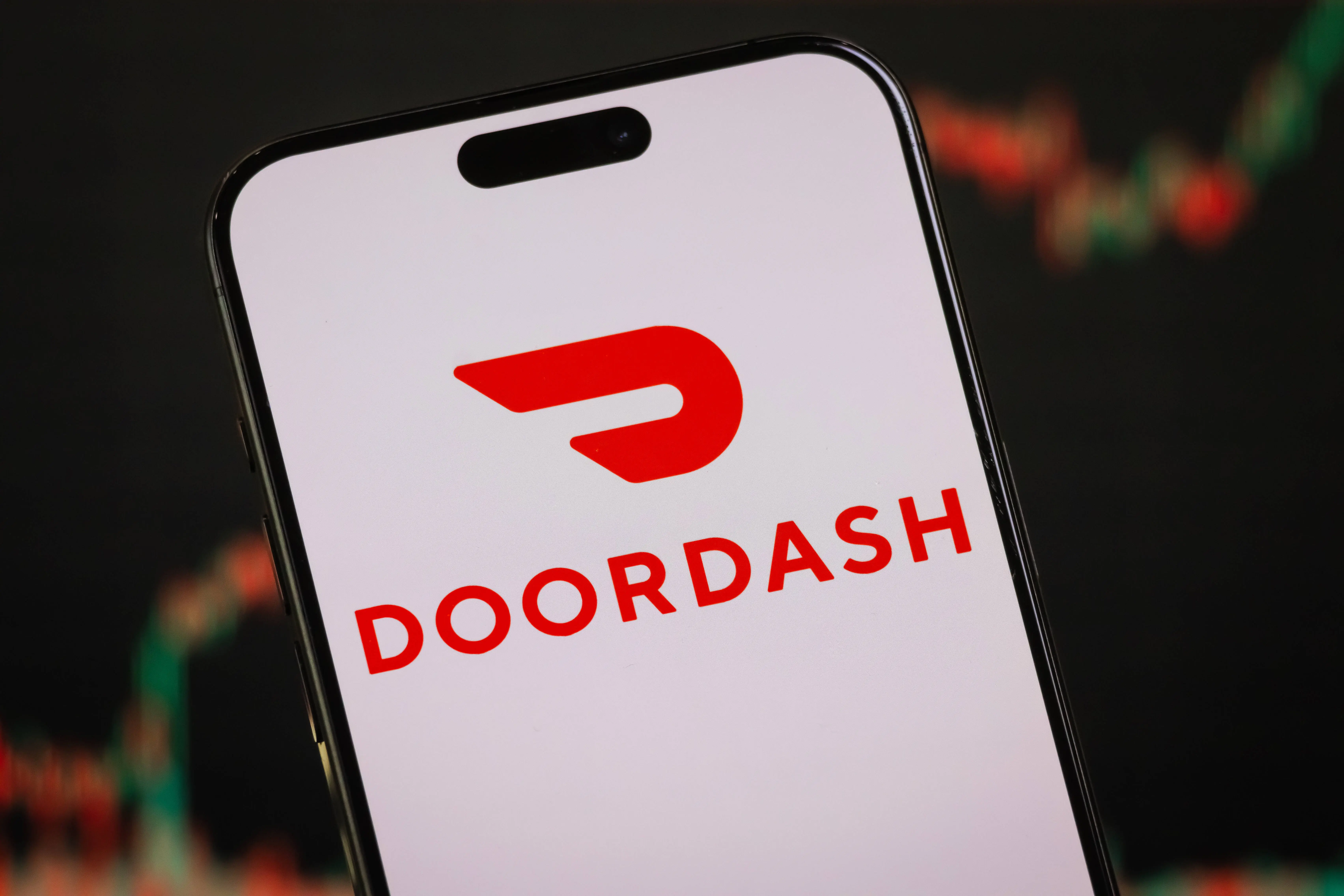 The DoorDash logo (Photo illustration by Cheng Xin/Getty Images)