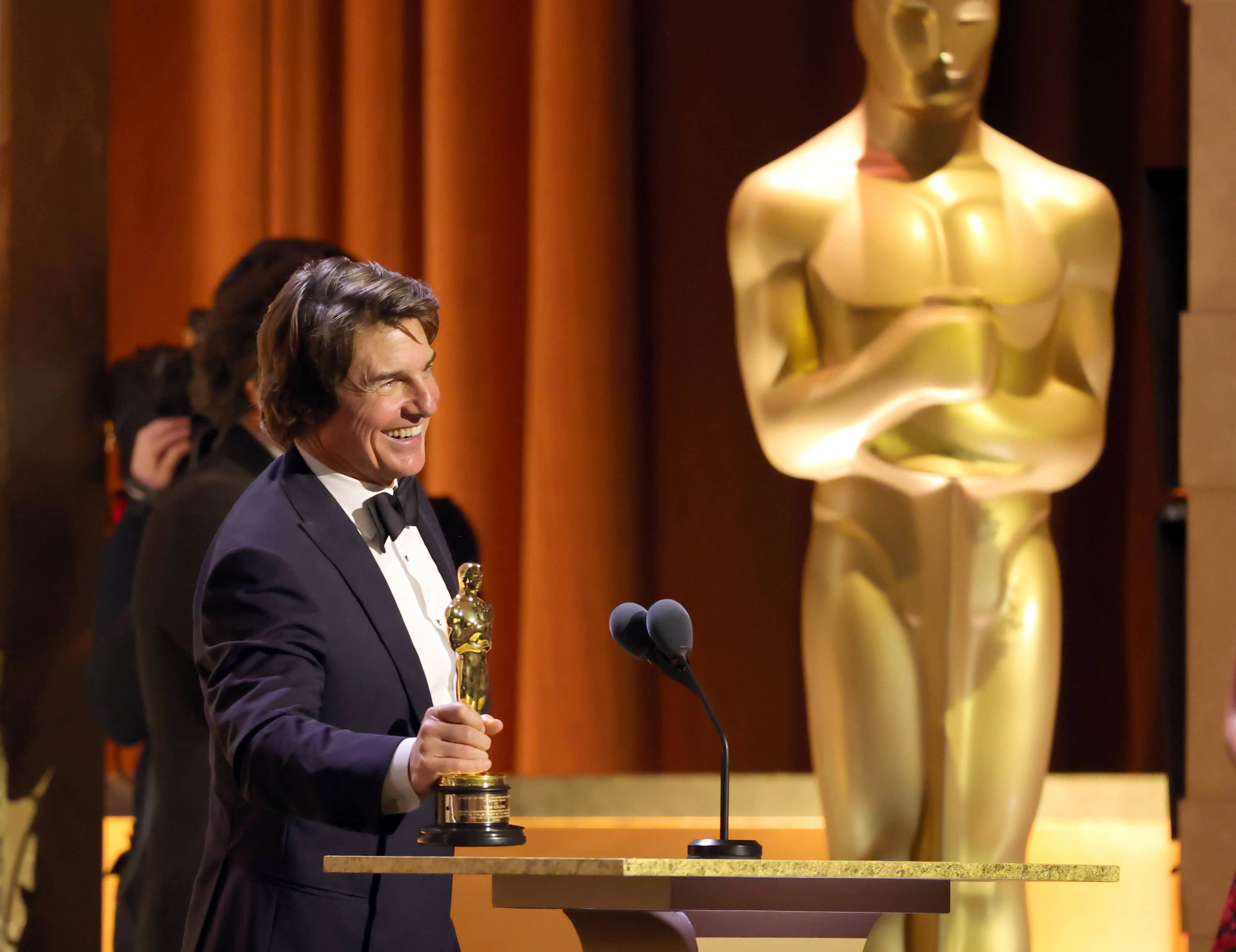 Tom Cruise and Debbie Allen joined in a lively celebration ahead of receiving their honorary Oscars (Photo by Kevin Winter/Getty Images)