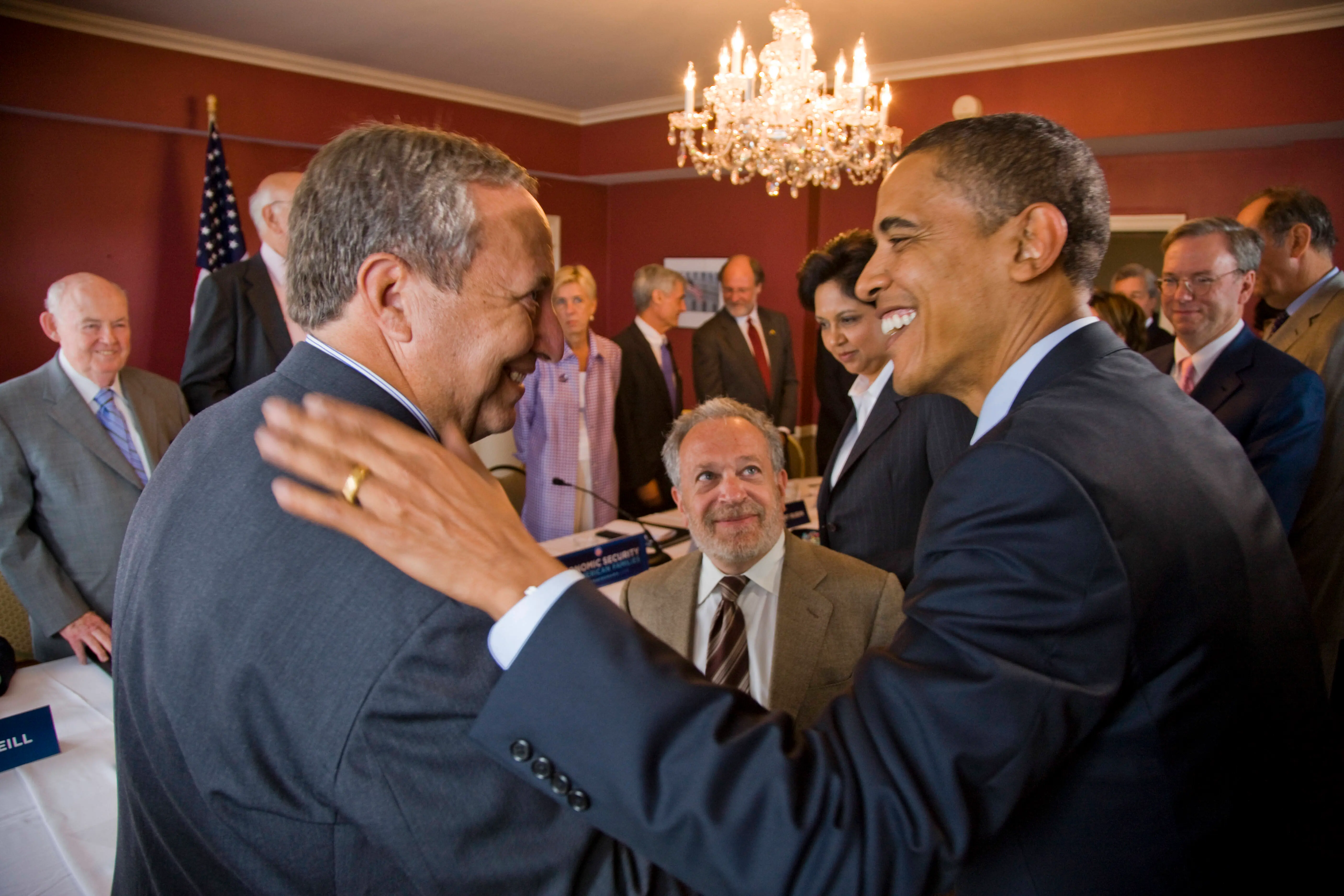 Democratic presidential candidate Senator Barack Obama, greets former Treasury Secretary Lawrence (Larry) Summers during a meeting with his economic advisors, in Washington DC, as Robert Reich (C), former Labor Secretary under Clinton, looks on. (Photo by Brooks Kraft LLC/Corbis via Getty Images)