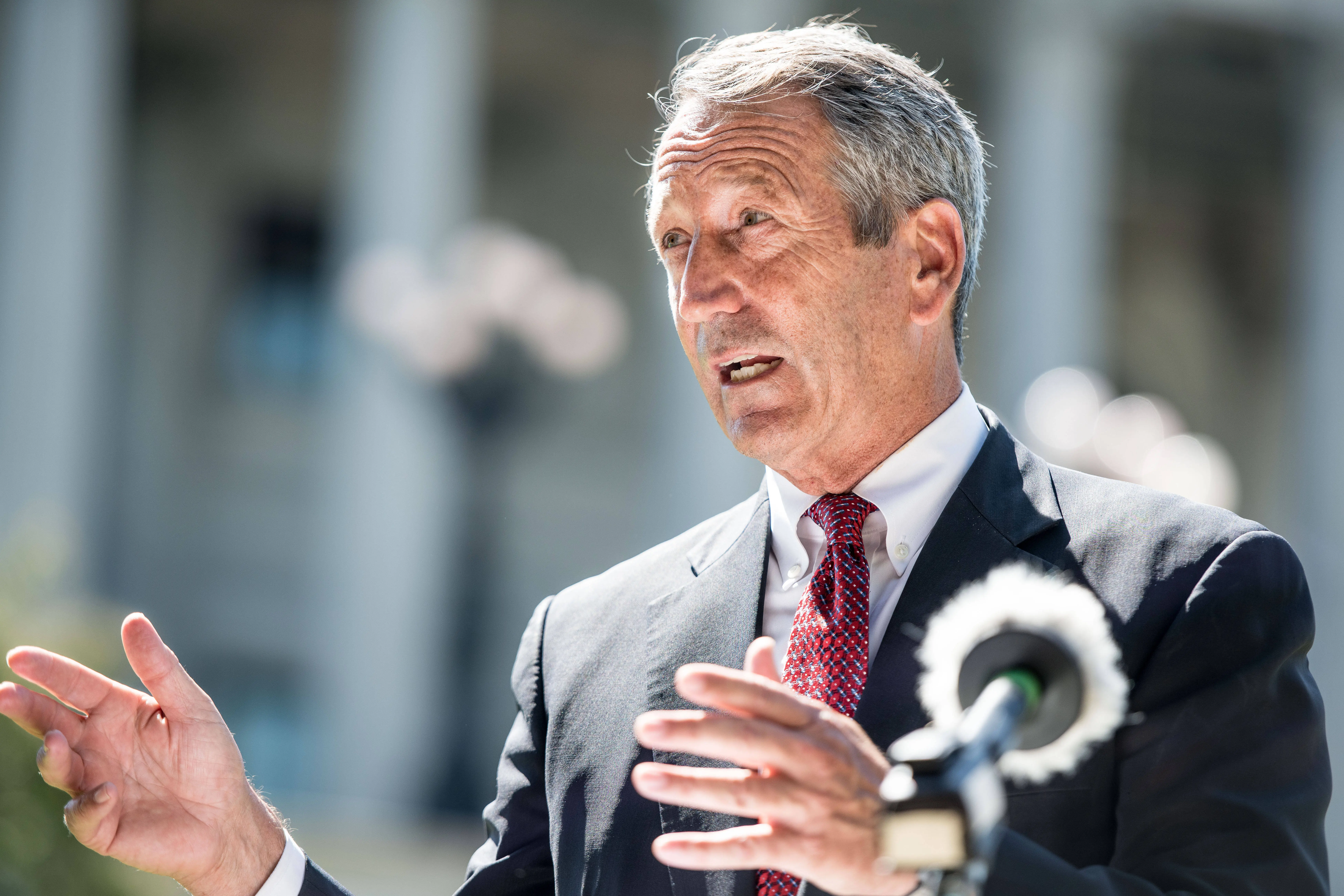 COLUMBIA, SC - SEPTEMBER 16: Former South Carolina Gov. Mark Sanford speaks to the media with a cardboard cutout of President Donald Trump during a campaign stop at the state house on September 16, 2019 in Columbia, South Carolina. Sanford is running against the Republican president in the primary election. (Photo by Sean Rayford/Getty Images)