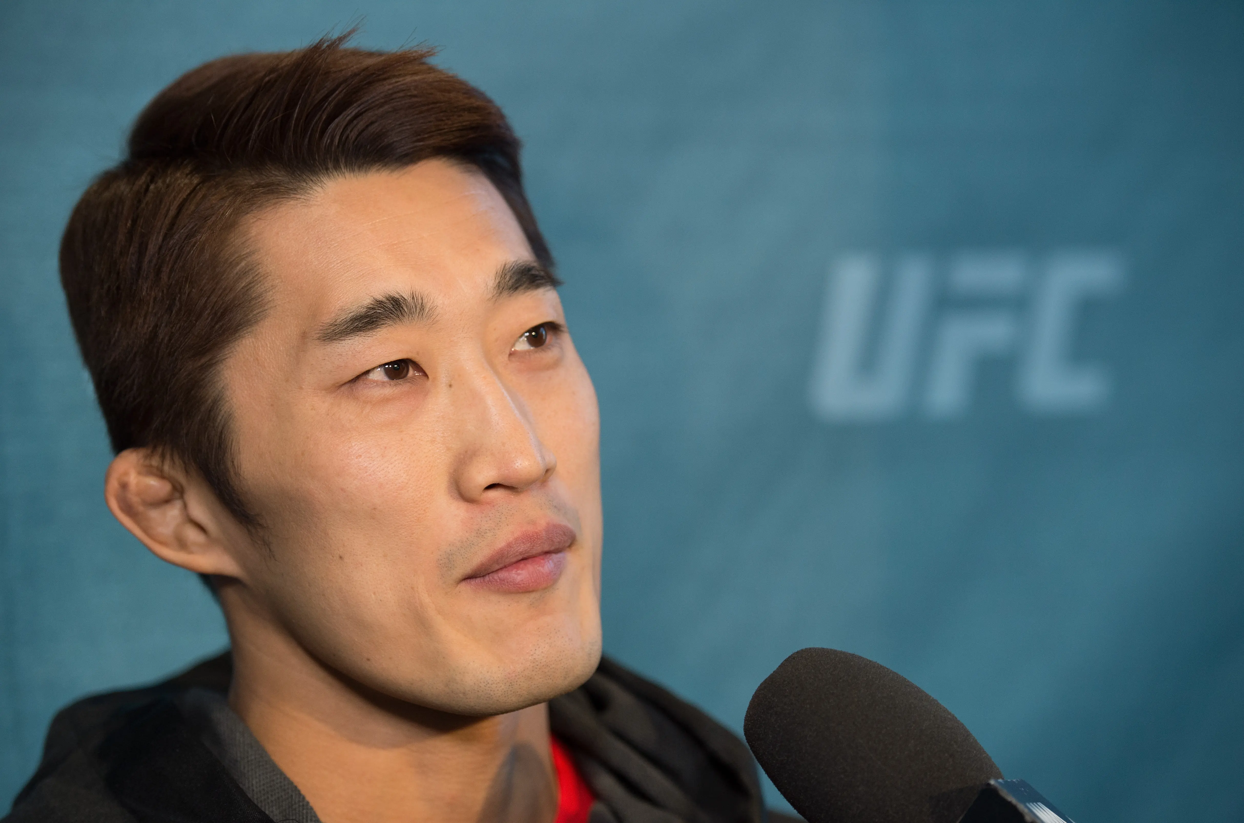 Dong Hyun Kim of South Korea speaks to the media during the UFC 207 Ultimate Media Day (Image via Getty)