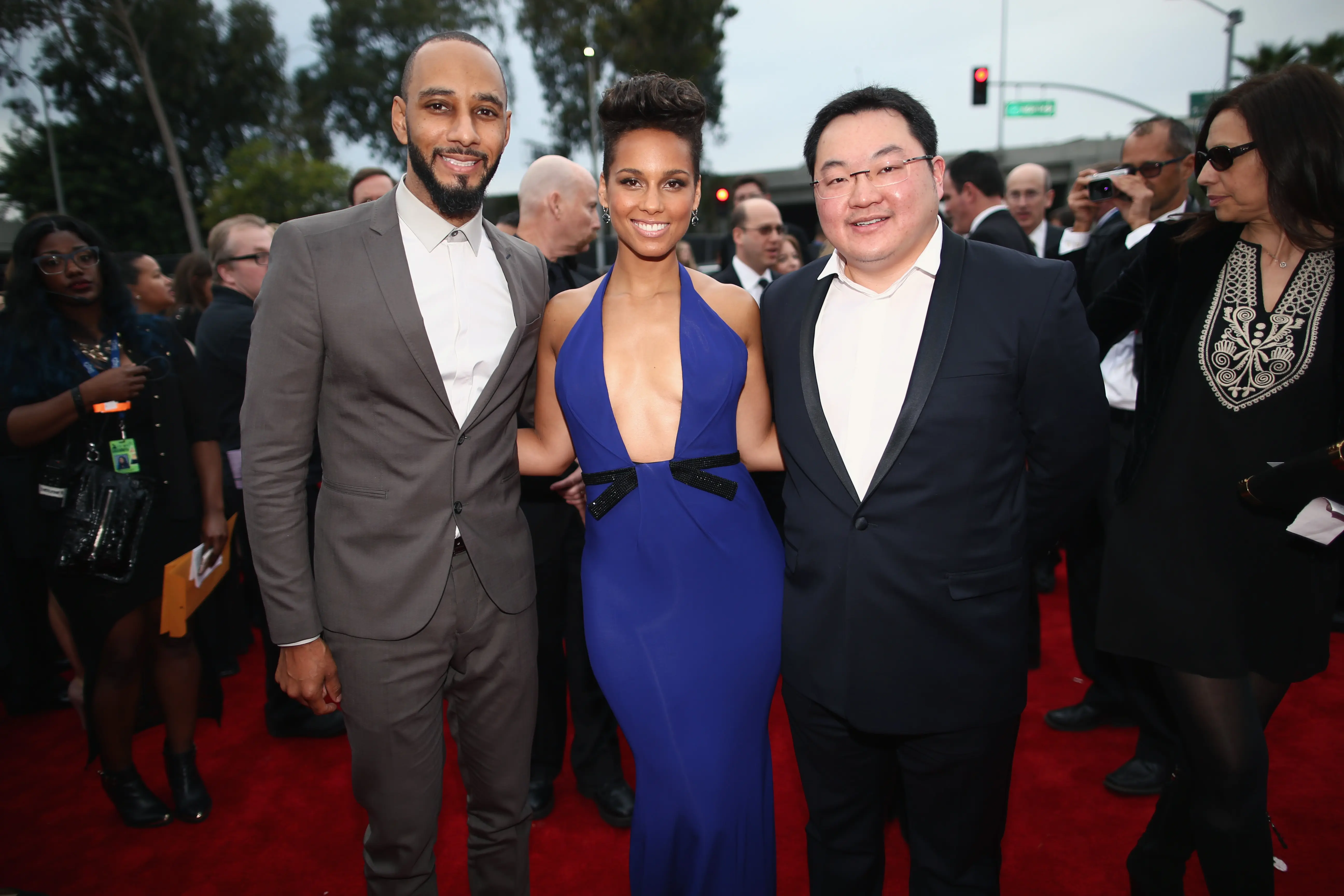 Producer Swizz Beatz, recording artist Alicia Keys and Owner, EMI Music Publishing and Chairman EMI Music Publishing Asia Jho Low attend the 56th GRAMMY Awards at Staples Center on January 26, 2014 in Los Angeles, California.  (Photo by Christopher Polk/Getty Images for NARAS)
