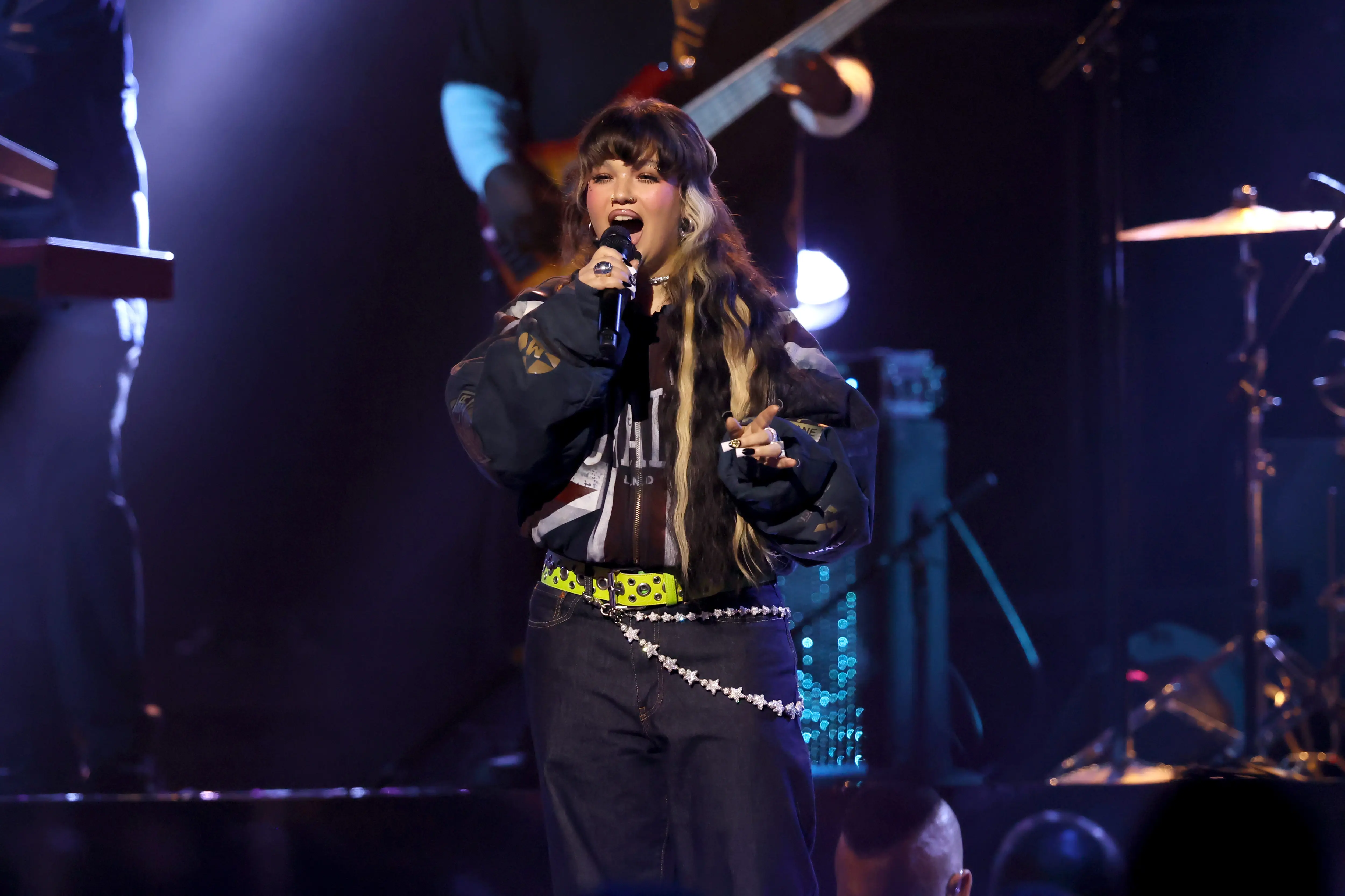 ELMONT, NEW YORK - SEPTEMBER 07: Lola Young performs during the 2025 MTV Video Music Awards at UBS Arena on September 07, 2025 in Elmont, New York. (Photo by Mike Coppola/Getty Images for MTV)