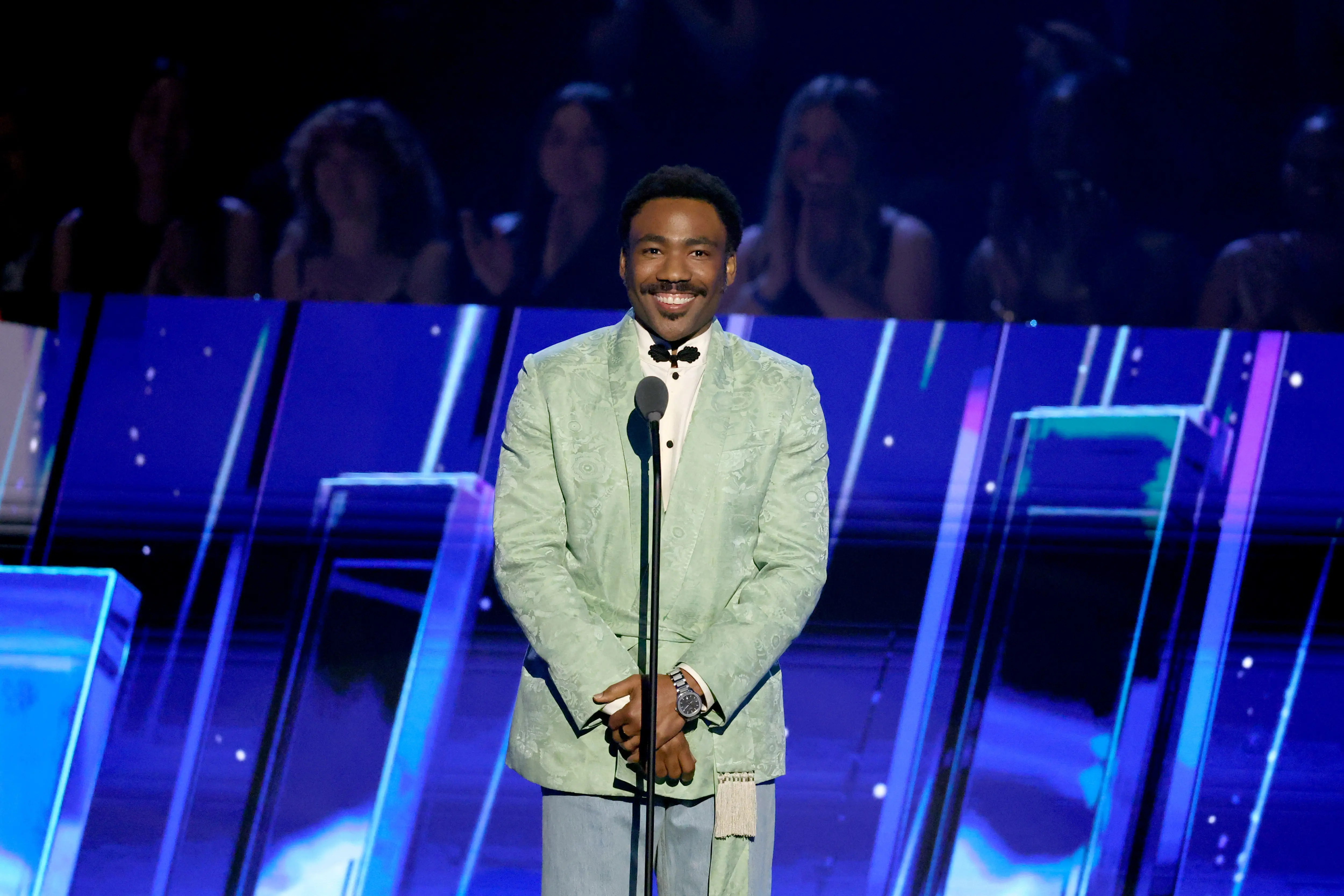 LOS ANGELES, CALIFORNIA - NOVEMBER 08: Donald Glover speaks onstage during the 2025 Rock &amp; Roll Hall of Fame Induction Ceremony at Peacock Theater on November 08, 2025 in Los Angeles, California. (Photo by Amy Sussman/WireImage)