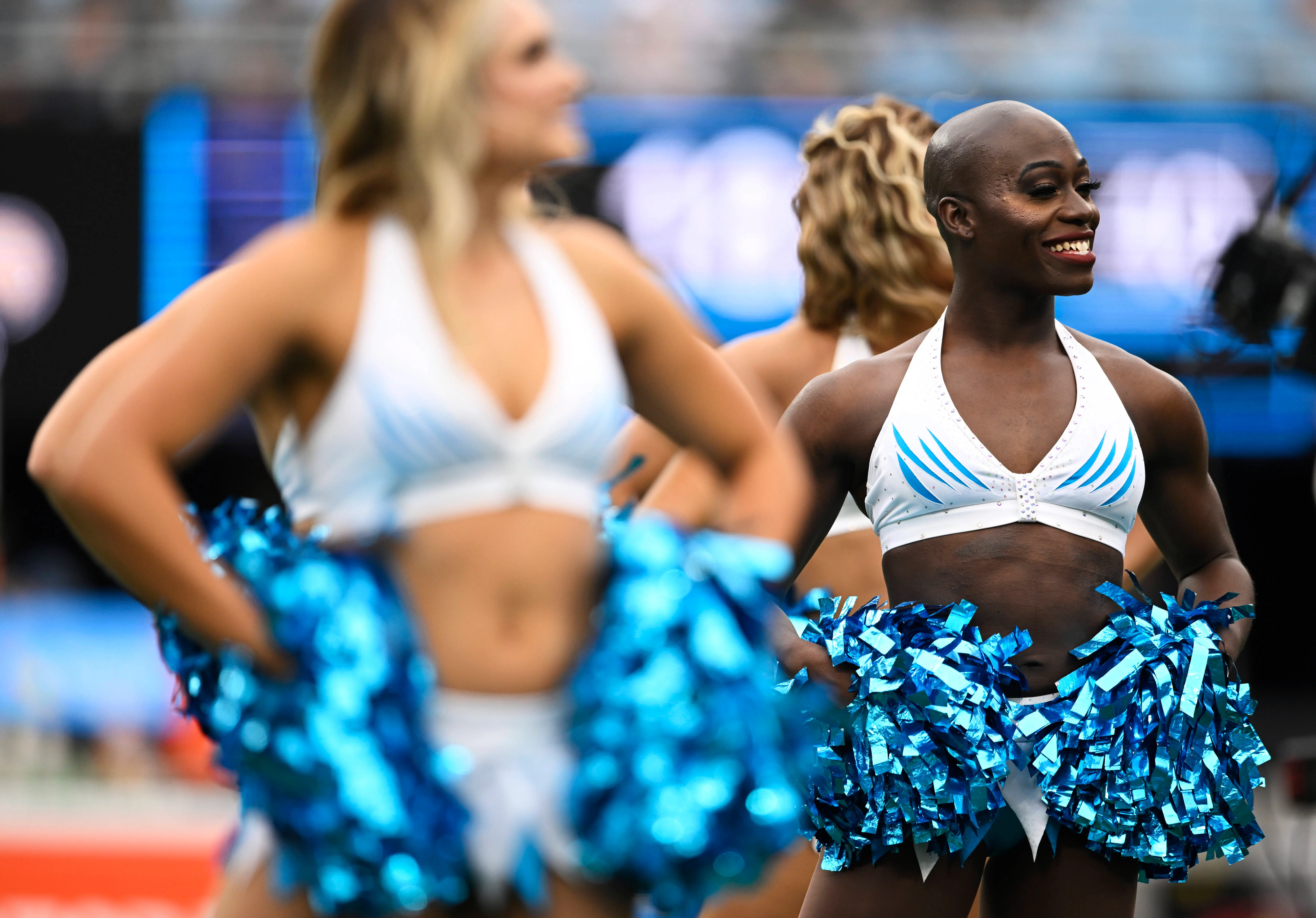 CHARLOTTE, NORTH CAROLINA - SEPTEMBER 25: Justine Lindsay of the Carolina Panthers TopCats performs before the Carolina Panthers and New Orleans Saints take the field at Bank of America Stadium on September 25, 2022 in Charlotte, North Carolina. (Photo by Eakin Howard/Getty Images)