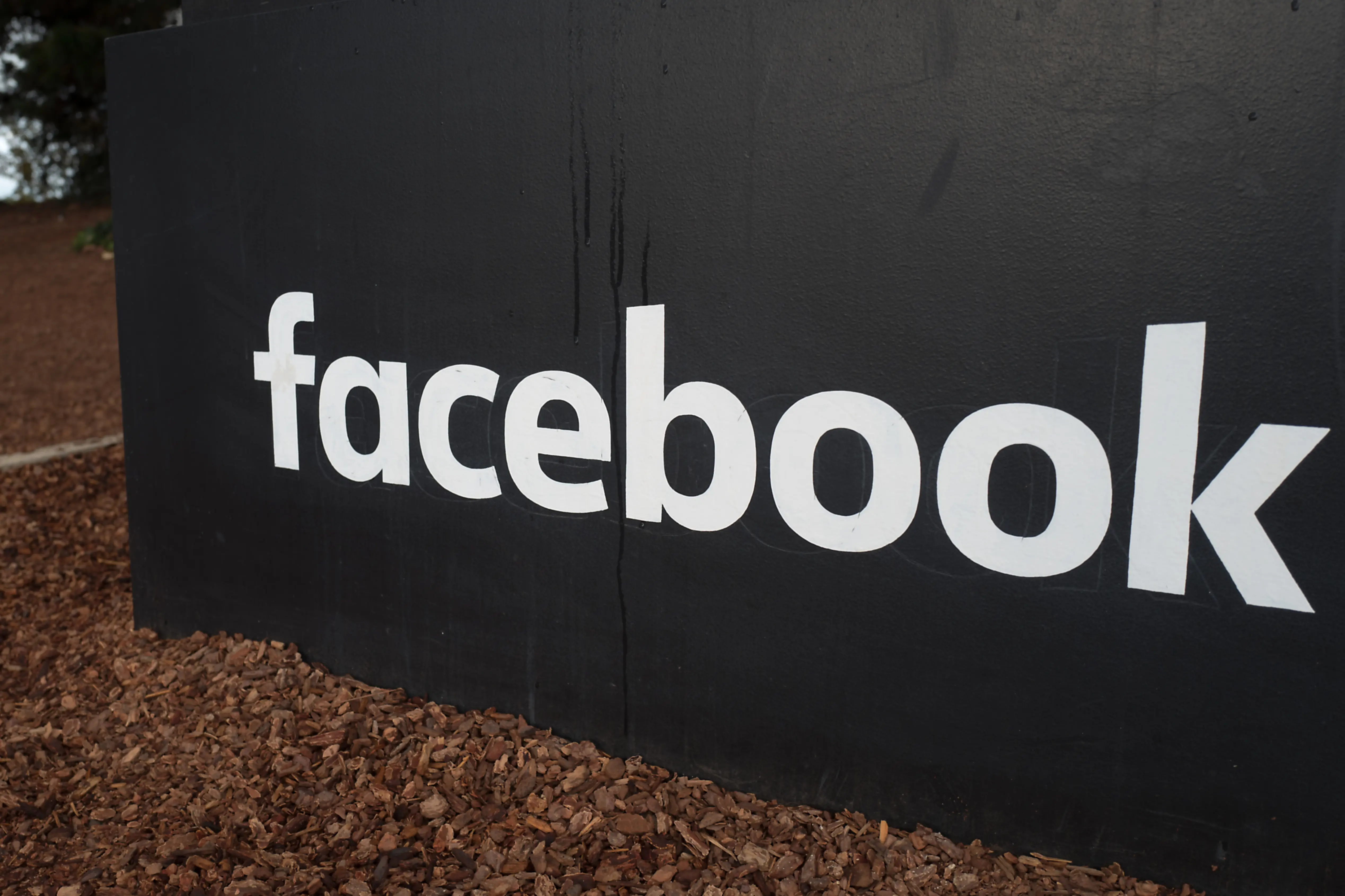 Sign with logo at the headquarters of social network company Facebook in Silicon Valley, Menlo Park, California, November 10, 2017. (Photo by Smith Collection/Gado/Getty Images)