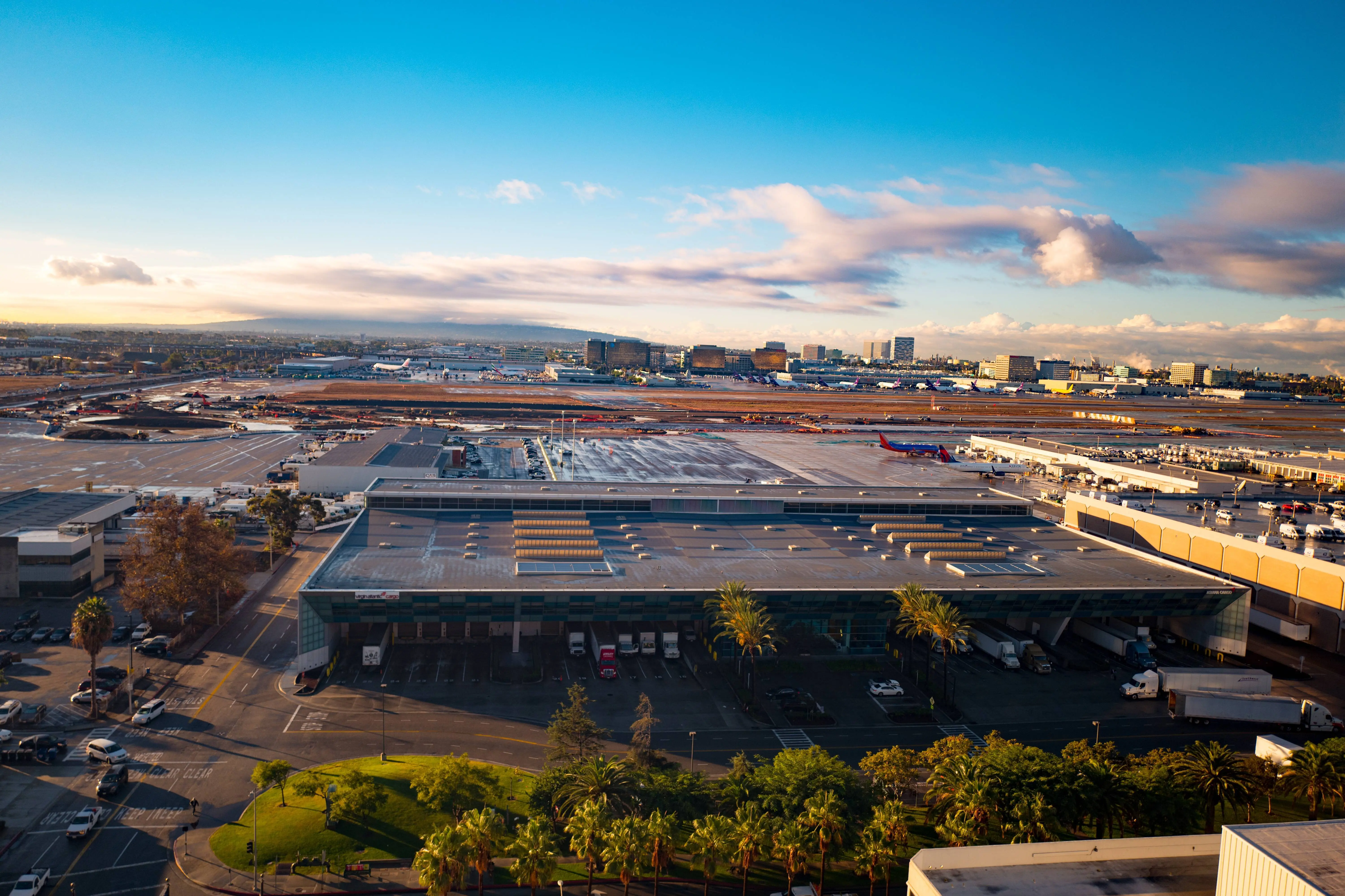 Aerial view, at dawn, of Los Angeles International Airport, including runways and the Virgin cargo terminal, Los Angeles, California, November 21, 2016. (Photo via Smith Collection/Gado/Getty Images).