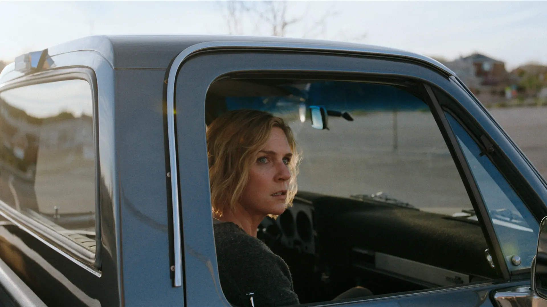 Rhea Seehorn in Pluribus, now streaming on Apple TV. (Image via Apple.com)