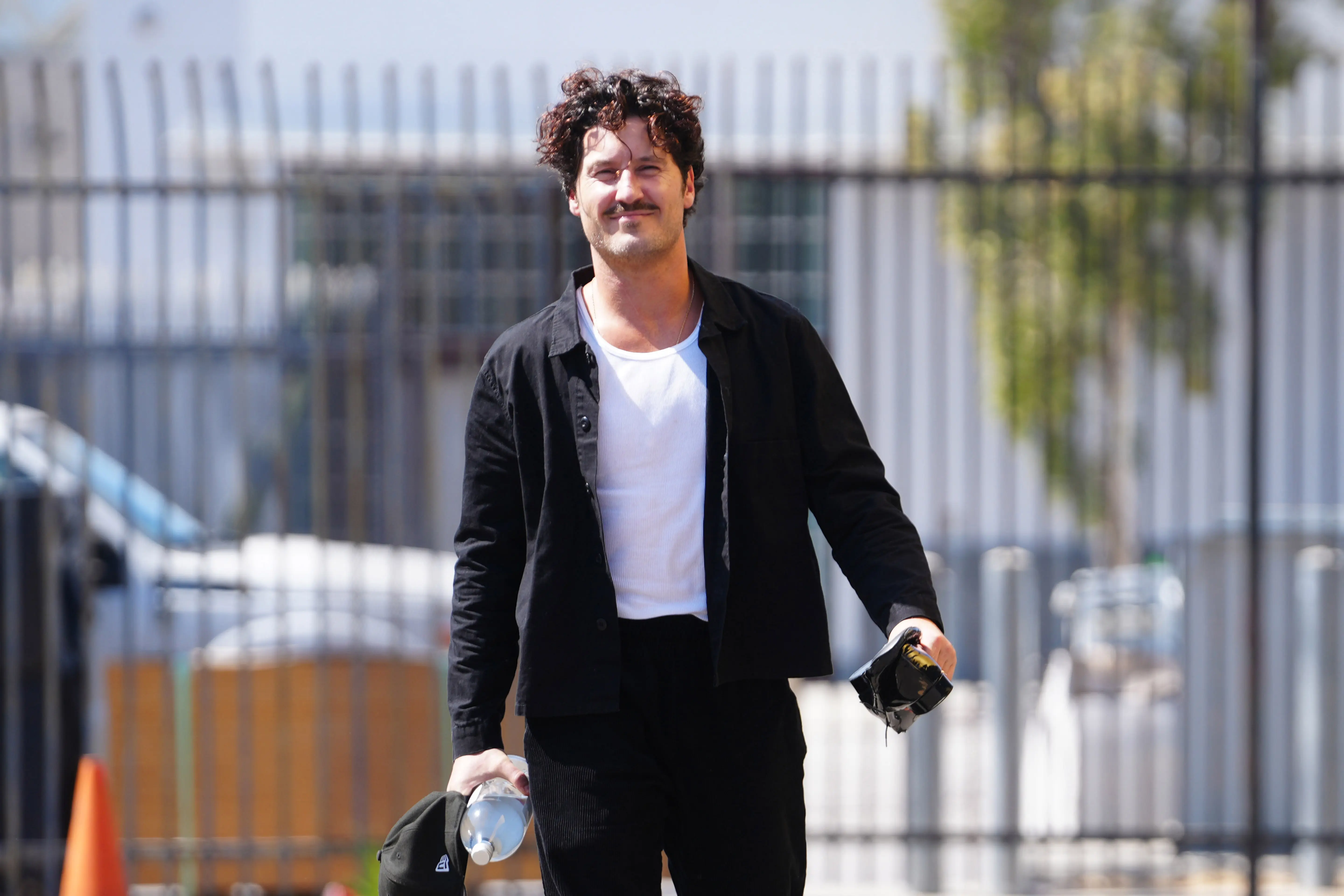 Val Chmerkovskiy is seen arriving at "Dancing With The Stars" (Image via Getty)