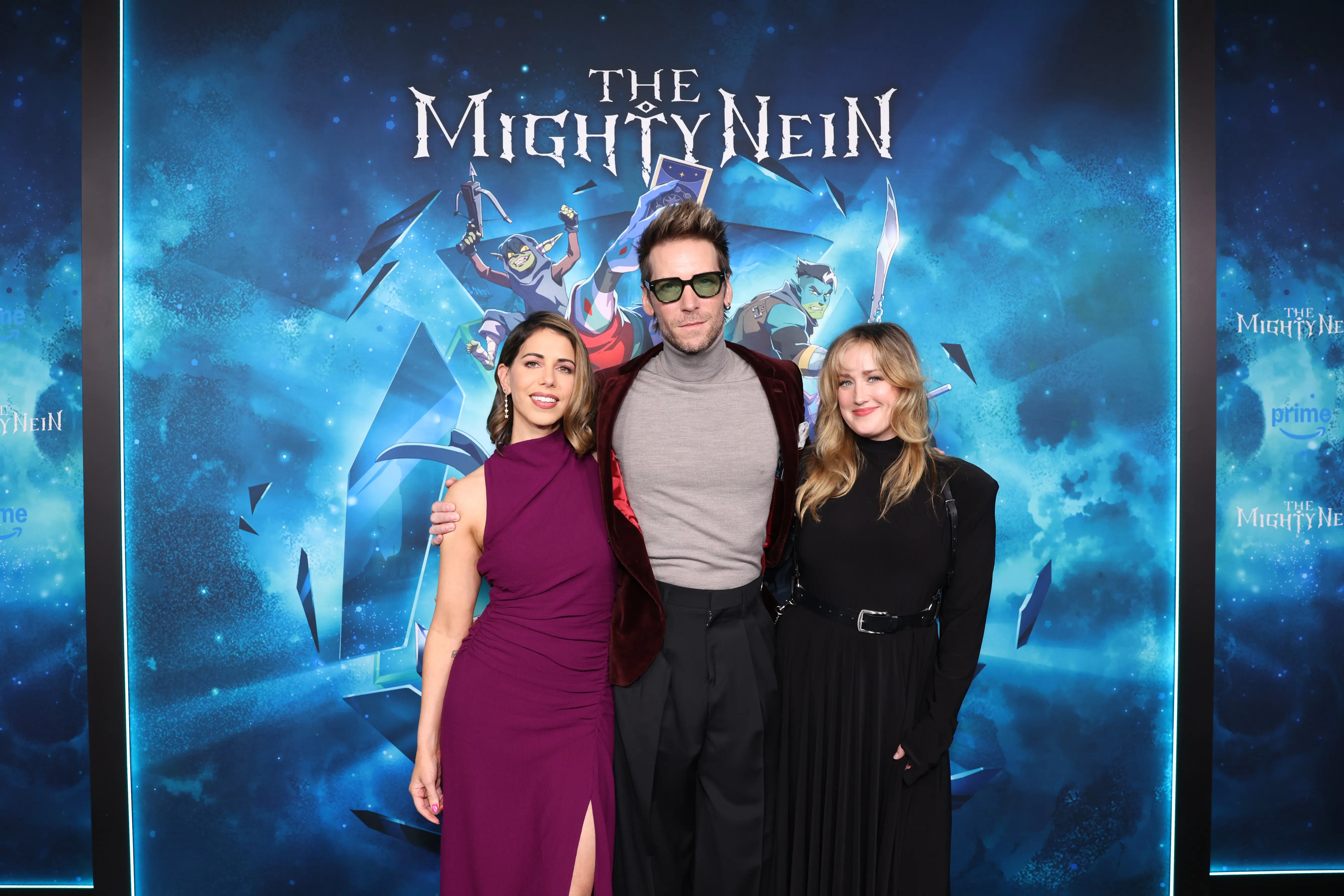 LOS ANGELES, CALIFORNIA - NOVEMBER 13: (L-R) Laura Bailey, Troy Baker and Ashley Johnson attend "The Mighty Nein" Season 1 Los Angeles Red Carpet Premiere at NYA WEST on November 13, 2025 in Los Angeles, California. (Photo by Anna Webber/Getty Images for Prime Video)