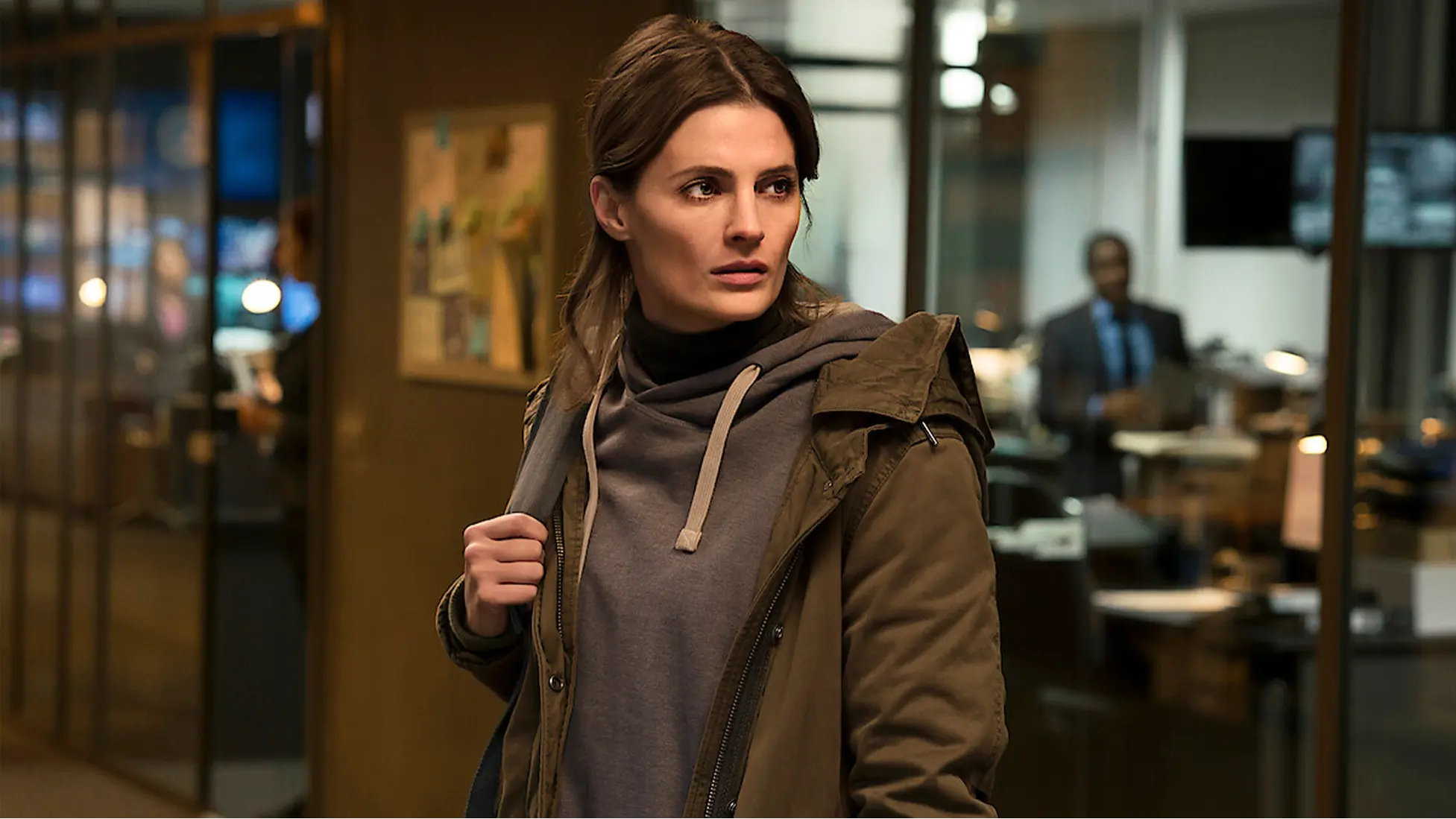 Stana Katic as Emily Byrne in Absentia, inside the FBI bullpen. (Image via Netflix)