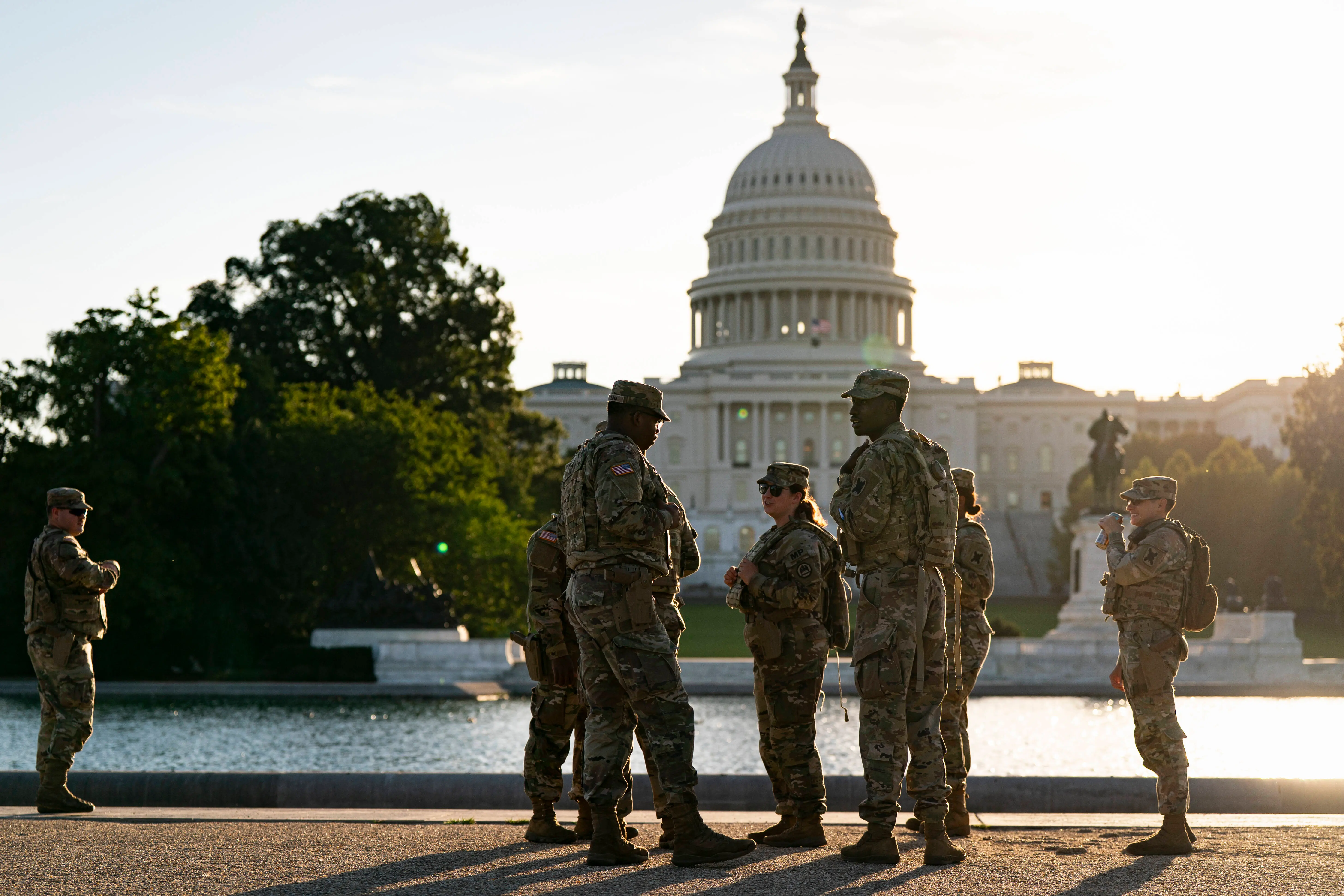 Members of the National Guard patrol near the U.S. Capitol on October 1, 2025 in Washington, DC. (Photo by Al Drago/Getty Images)