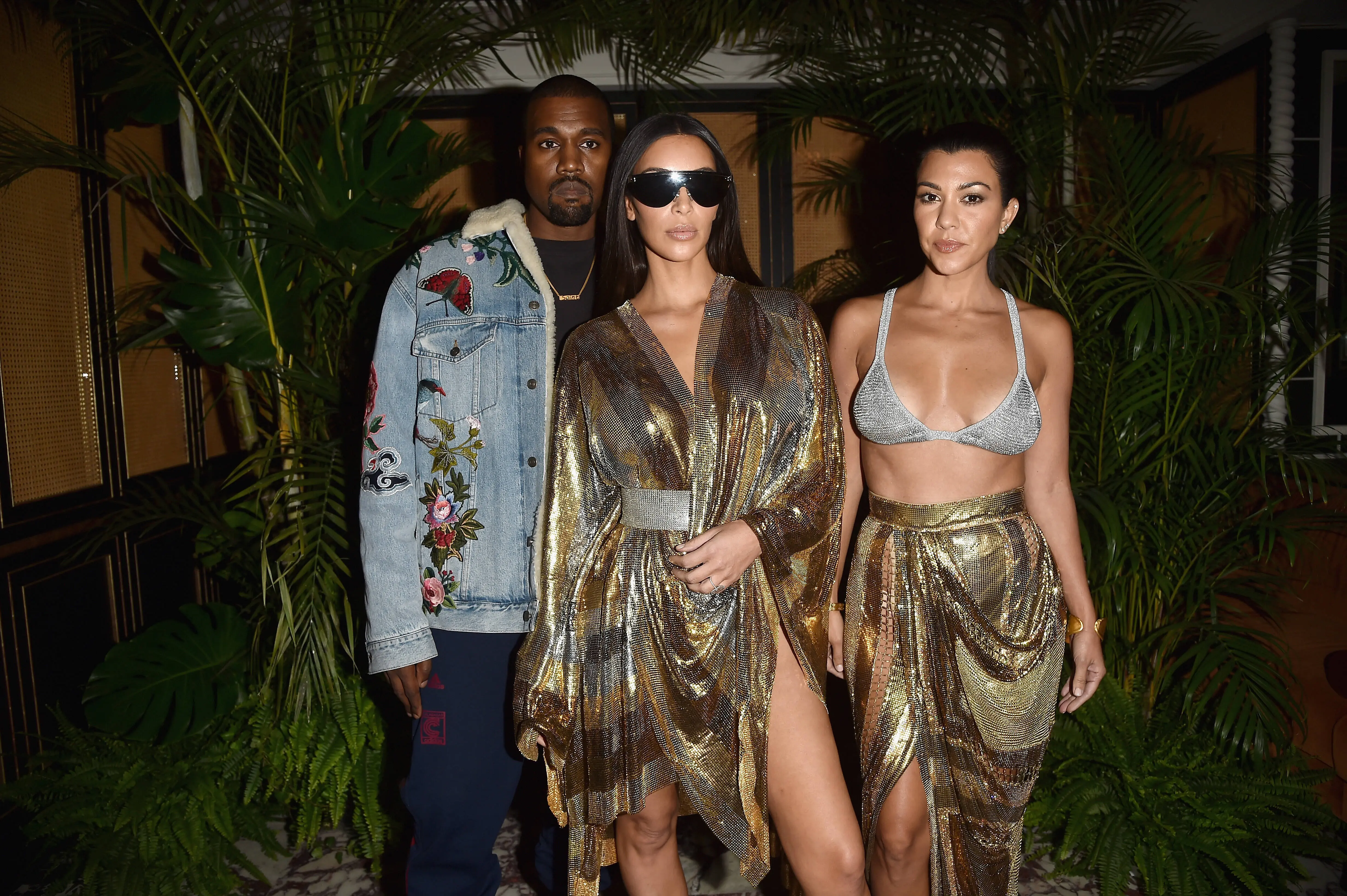 Kanye West,  Kim Kardashian and Kourtney Kardashian (Image Via Getty)