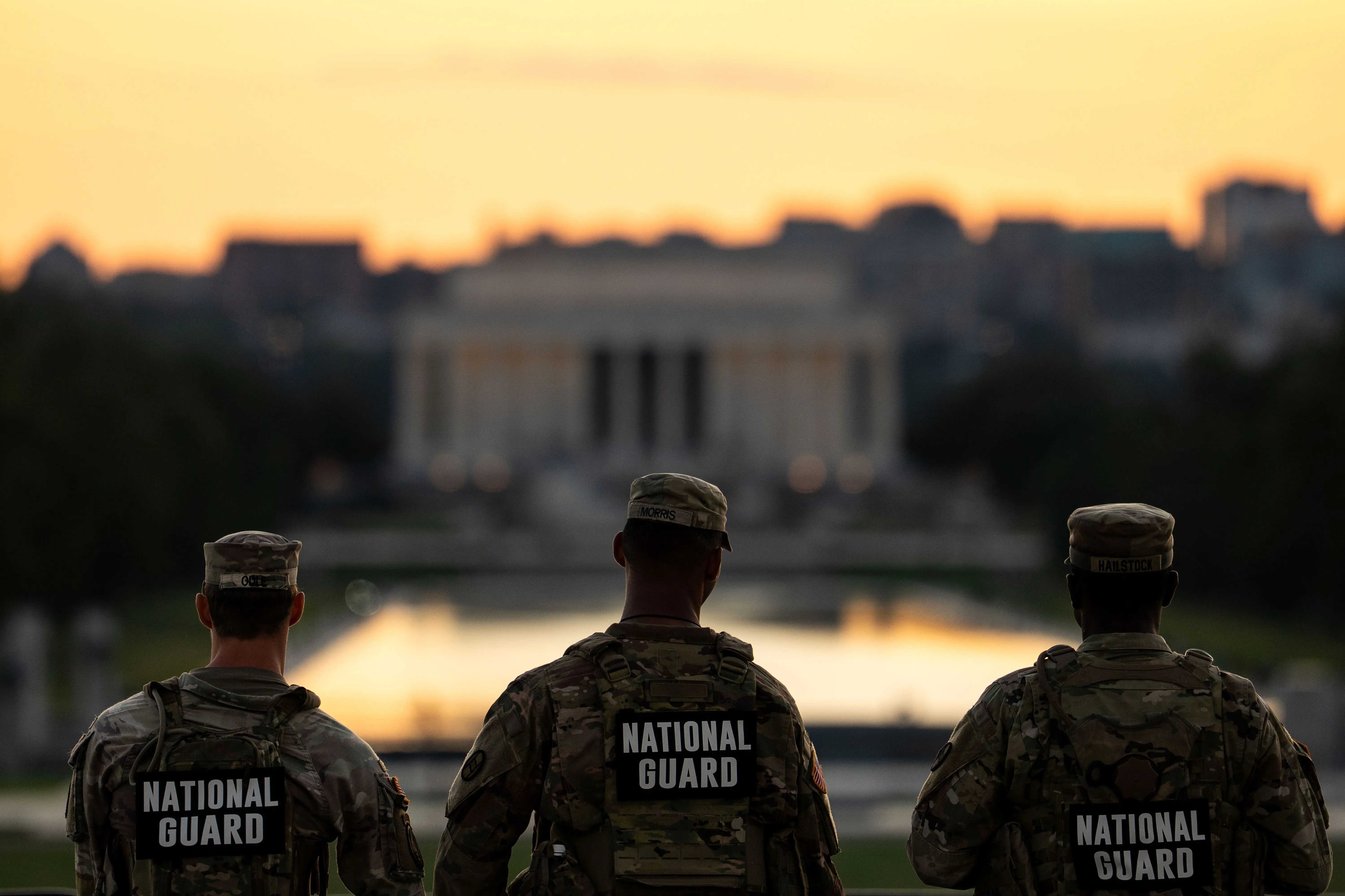 WASHINGTON, DC - SEPTEMBER 2: Members of the National Guard are seen standing near the Washington Monument, on September 02, 2025 in Washington, DC.  Members of the National Guard and Federal Law Enforcement continue to patrol the Nation's Capital, weeks after U.S. President Donald Trump ordered the National Guard and law enforcement to patrol the nation's capital to assist in crime prevention with more than 2,200 National Guard troops have been deployed in Washington, D.C., a mission that experts estimate is costing over $1 million a day when factoring in pay, housing, travel, food, fuel and other logistics, according to comparisons with the 2020 mobilization of 5,000 Guard members that cost more than $2 million daily. (Photo by Kent Nishimura/Getty Images)