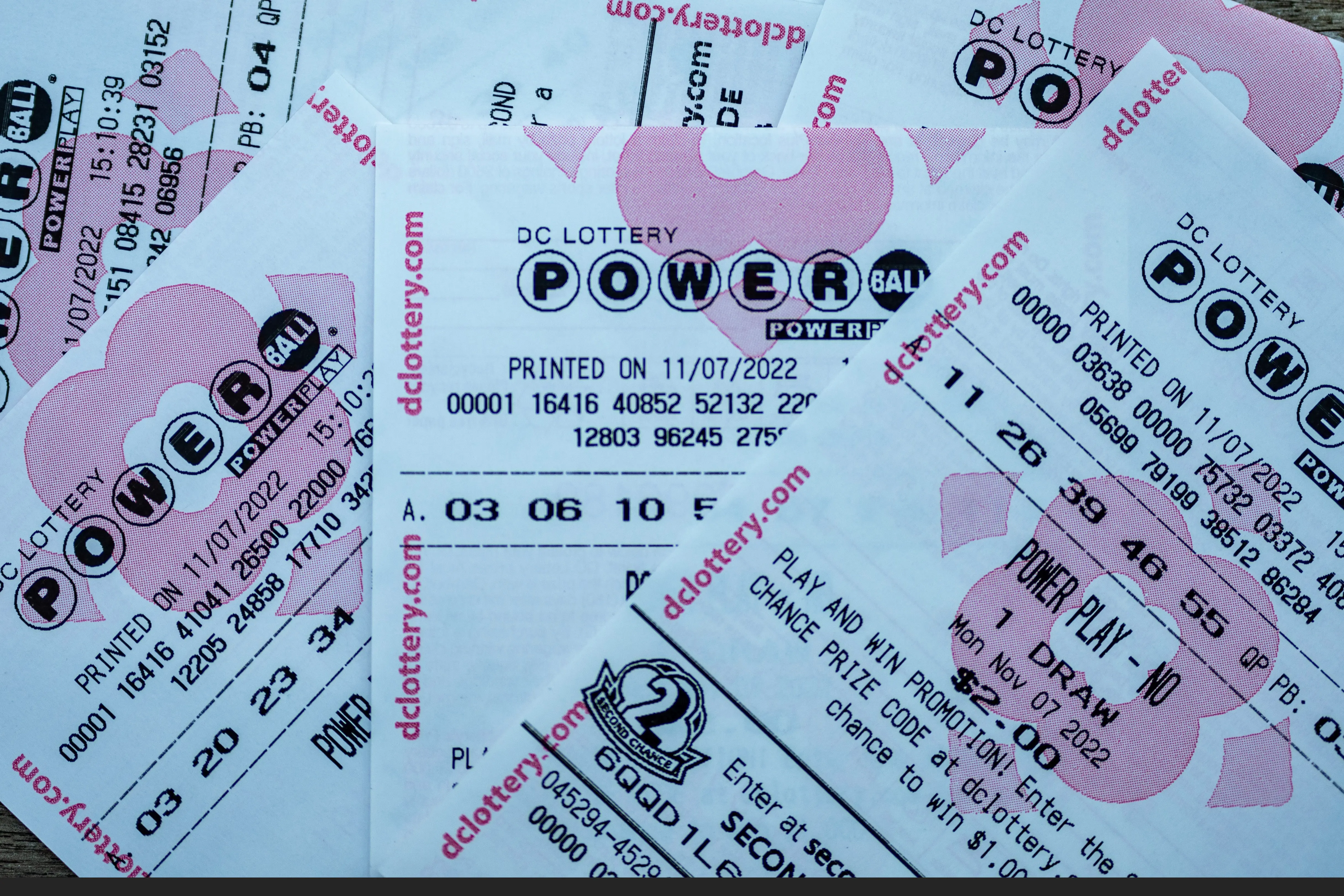 WASHINGTON, DC - NOVEMBER 07: In this photo illustration, tickets for the upcoming Powerball lottery are seen on November 07, 2022 in Washington, DC. The estimated Powerball jackpot for the November 7th drawing has increased to $1.9 billion, with an estimated lump sum payment of $929.1 million. (Photo illustration by Tasos Katopodis/Getty Images)