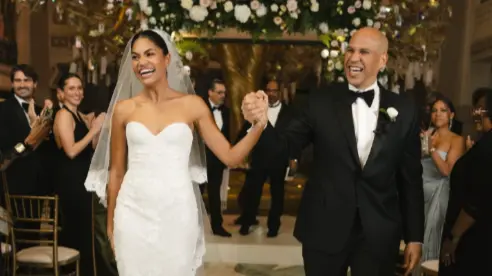 Alexis Lewis and Cory Booker (Image via X/@philiplewis)