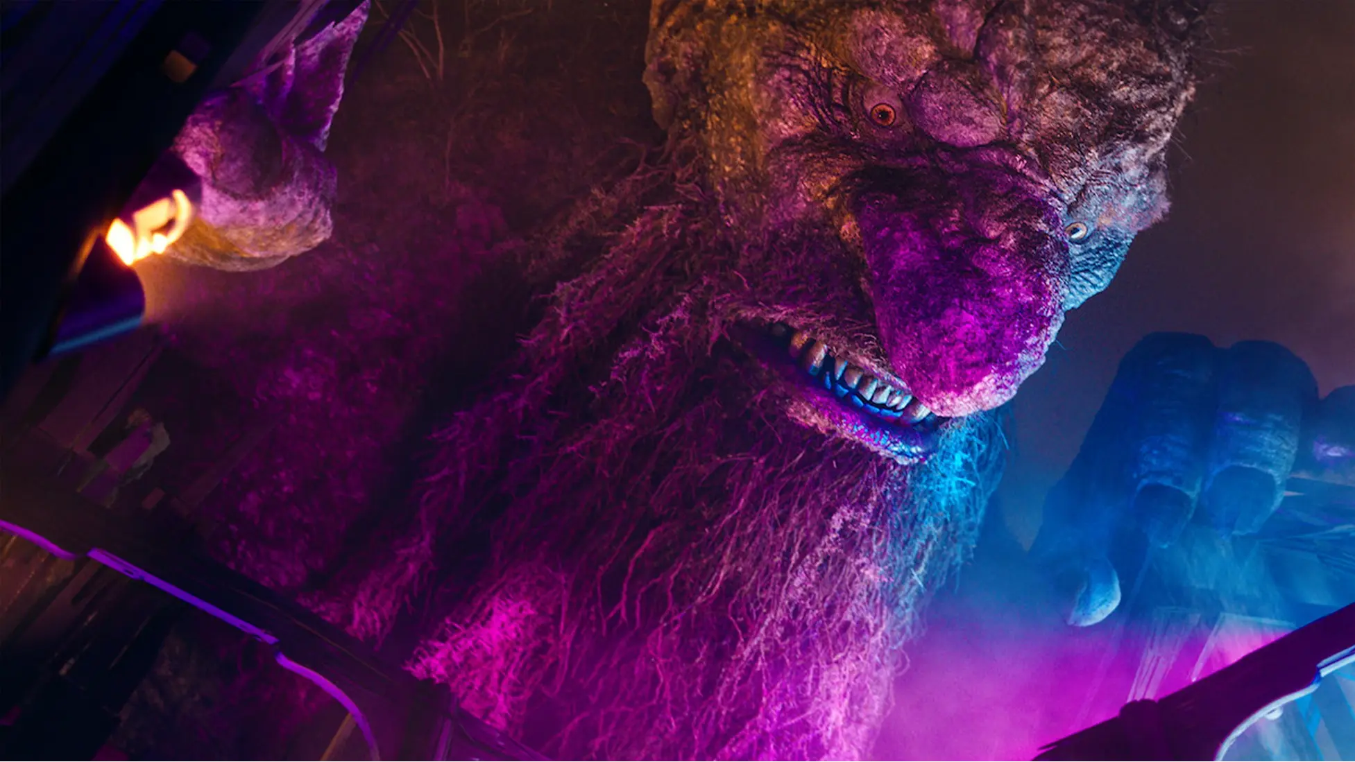 Troll 2, a new giant troll towers over a Norwegian village as response teams close in. (Image via Netflix)