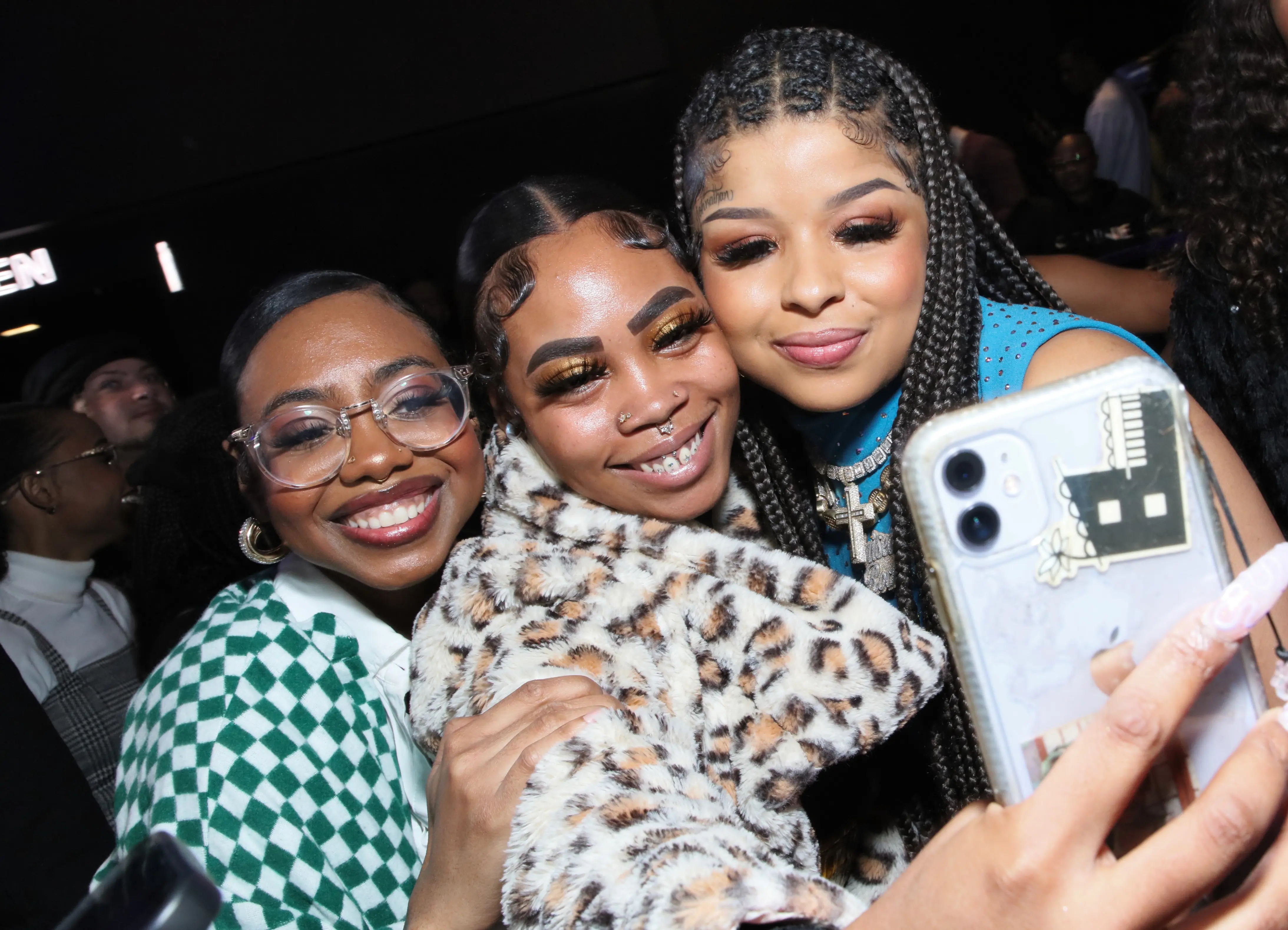 Baddies Chrisean Rock poses with fans at the Premiere Of The Zeus Network's "Baddies West" (Image via Getty)
