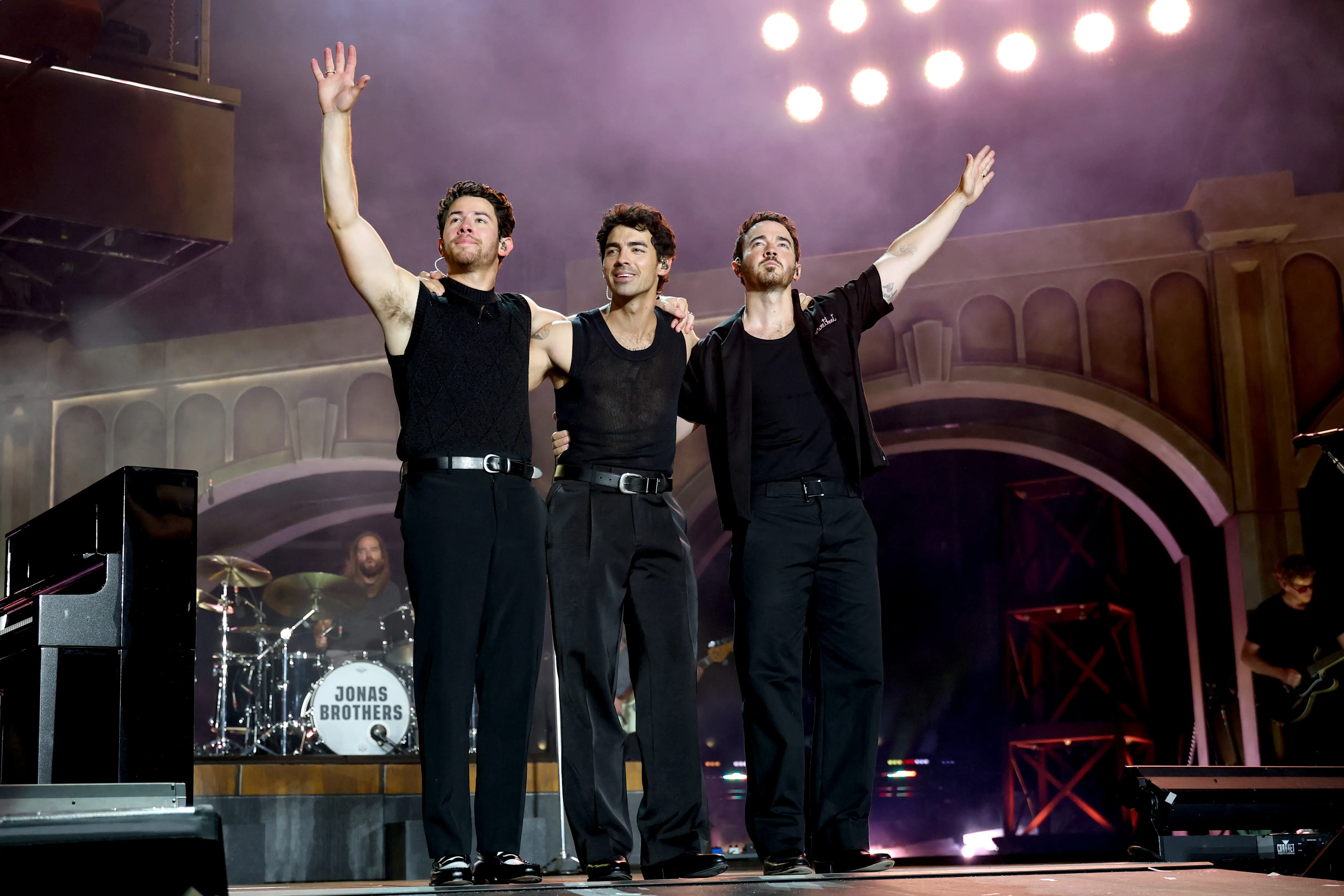 EAST RUTHERFORD, NEW JERSEY - AUGUST 10: (L-R) Nick Jonas, Joe Jonas, and Kevin Jonas perform onstage during the Jonas Brothers: JONAS20 Greetings From Your Hometown tour kick off at Met Life Stadium on August 10, 2025 in East Rutherford, New Jersey. (Photo by Kevin Mazur/Getty Images for Live Nation)