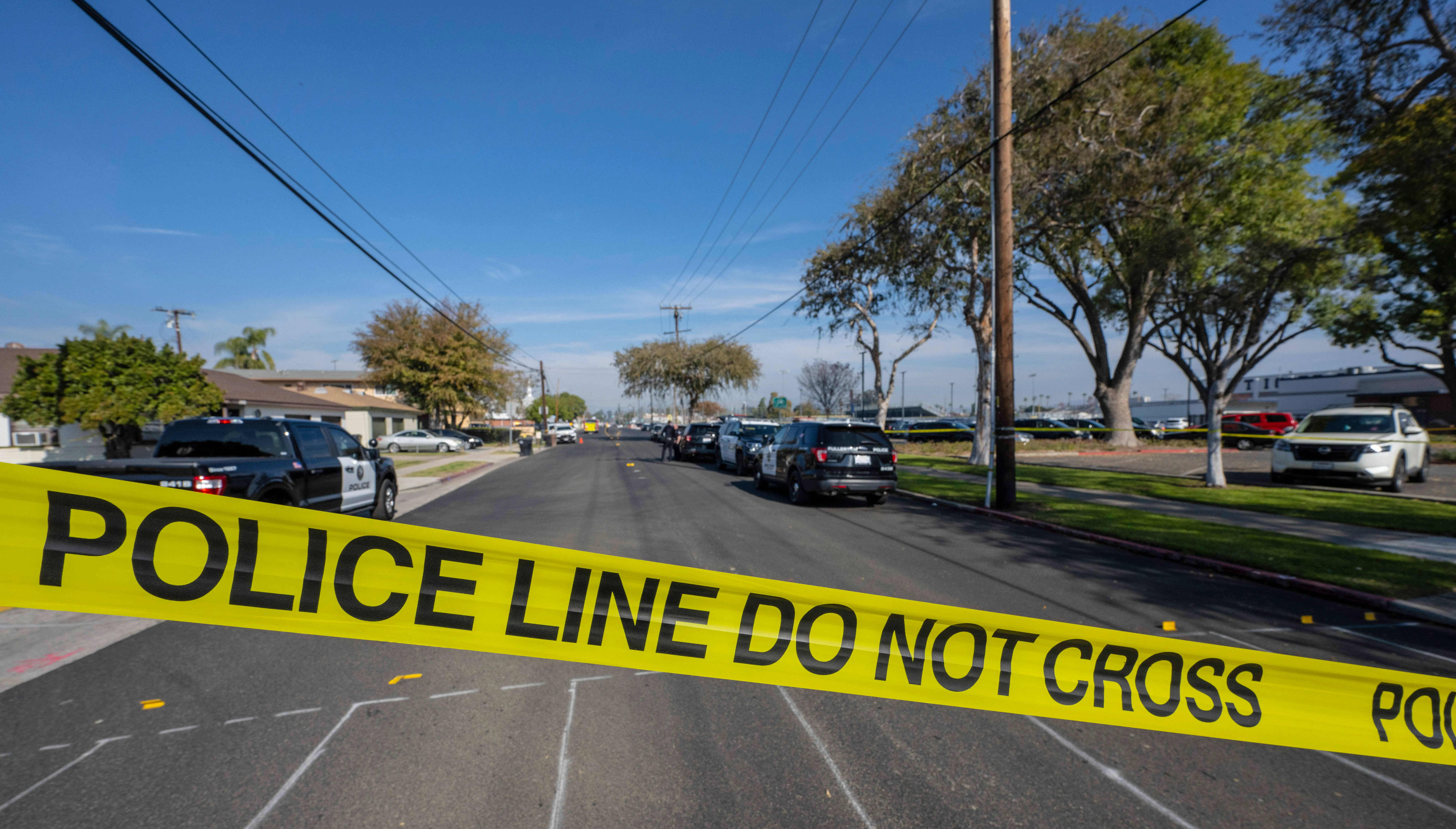Placentia, CA - January 16: Yellow tape closes off the 700 block of Bradford Avenue in Placentia as police search the area outside of St. Joseph Catholic Church in Placentia on Tuesday morning, January 16, 2024, after police received a call of a possible gunshot. The church was evacuated during Holy Communion and police searched for the gun. One person was detained. (Photo by Mark Rightmire/MediaNews Group/Orange County Register via Getty Images)