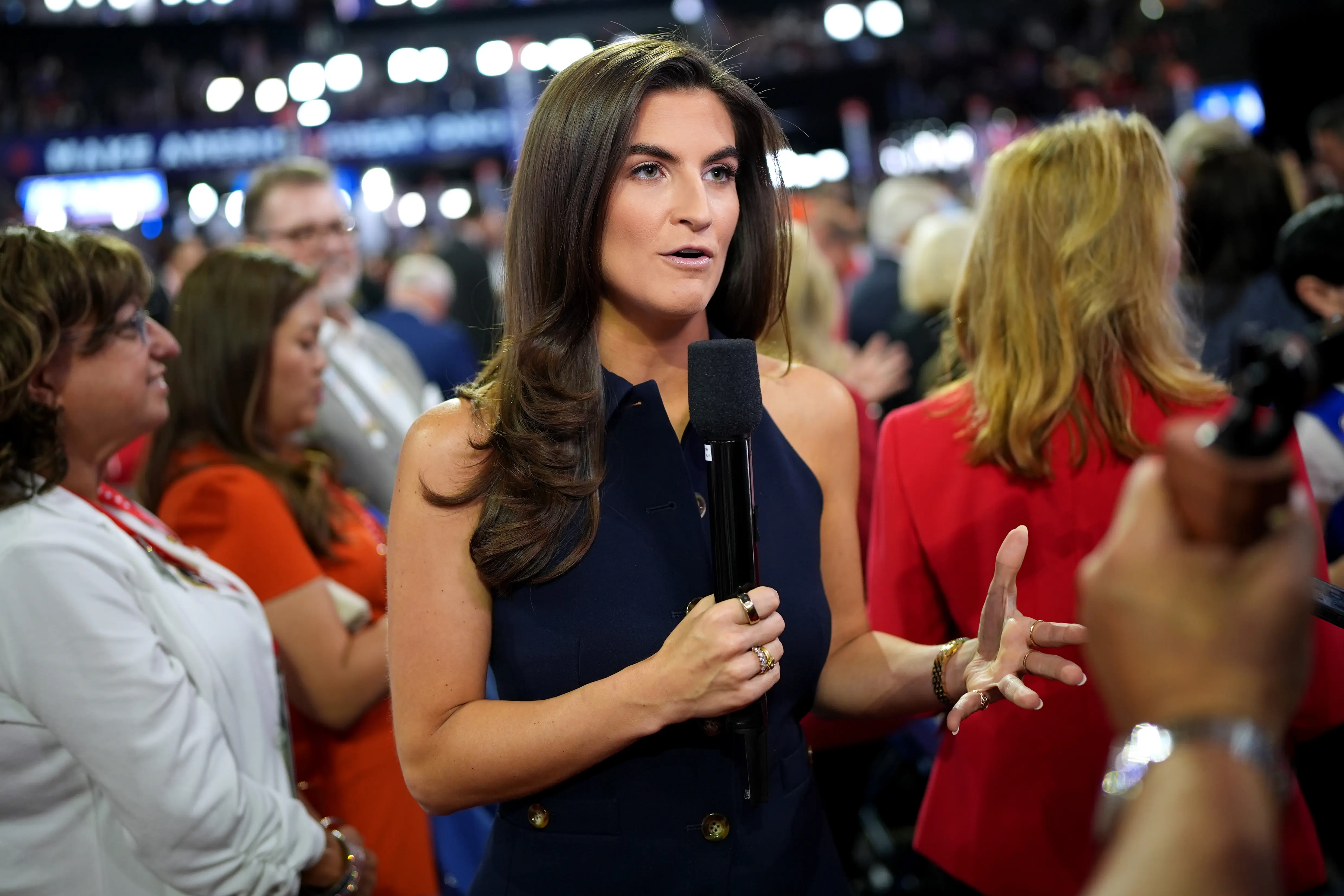 CNN journalist Kaitlan Collins reports on the first day of the Republican National Convention at the Fiserv Forum on July 15, 2024 in Milwaukee, Wisconsin. (Photo by Andrew Harnik/Getty Images)