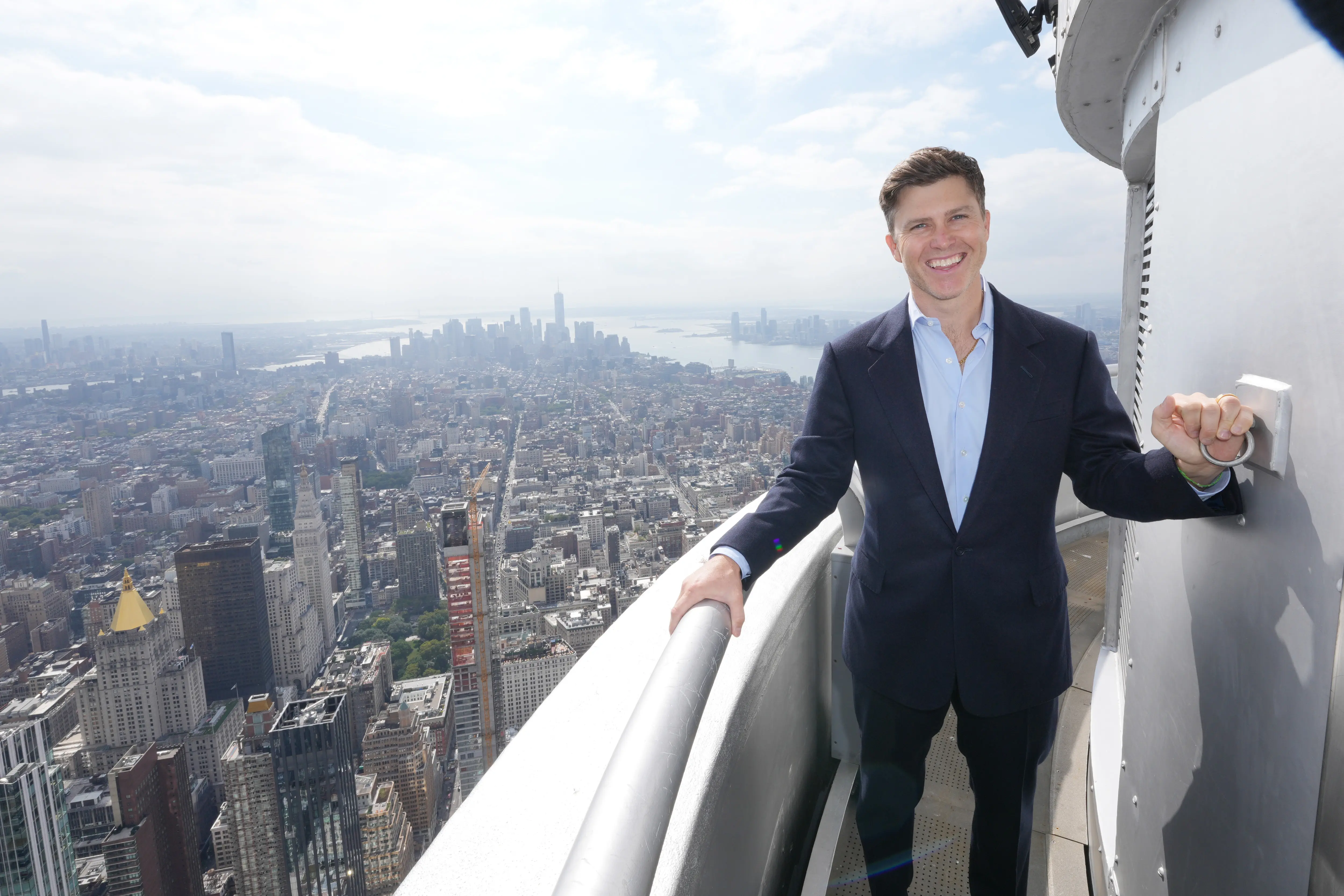 NEW YORK, NEW YORK - OCTOBER 03: Colin Jost lights the Empire State Building in Partnership with The New York Police and Fire Widows' and Children's Benefit Fund in Honor of Answer the Call Day at The Empire State Building on October 03, 2024 in New York City.  (Photo by John Nacion/Getty Images for Empire State Realty Trust)