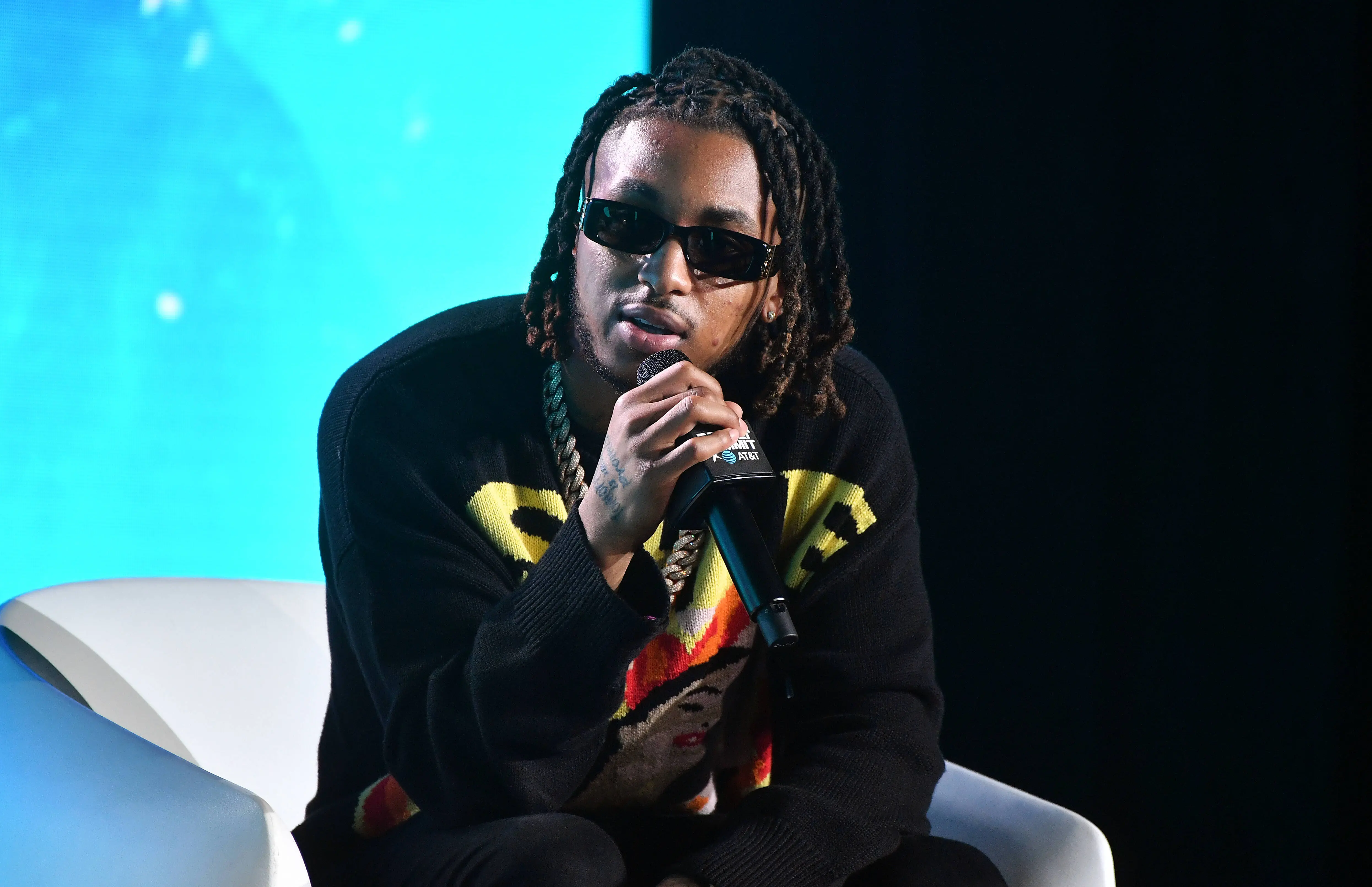 ATLANTA, GEORGIA - SEPTEMBER 25:  Rapper DDG speaks onstage during the 2022 Revolt Summit at 787 Windsor on September 25, 2022 in Atlanta, Georgia. (Photo by Paras Griffin/Getty Images)