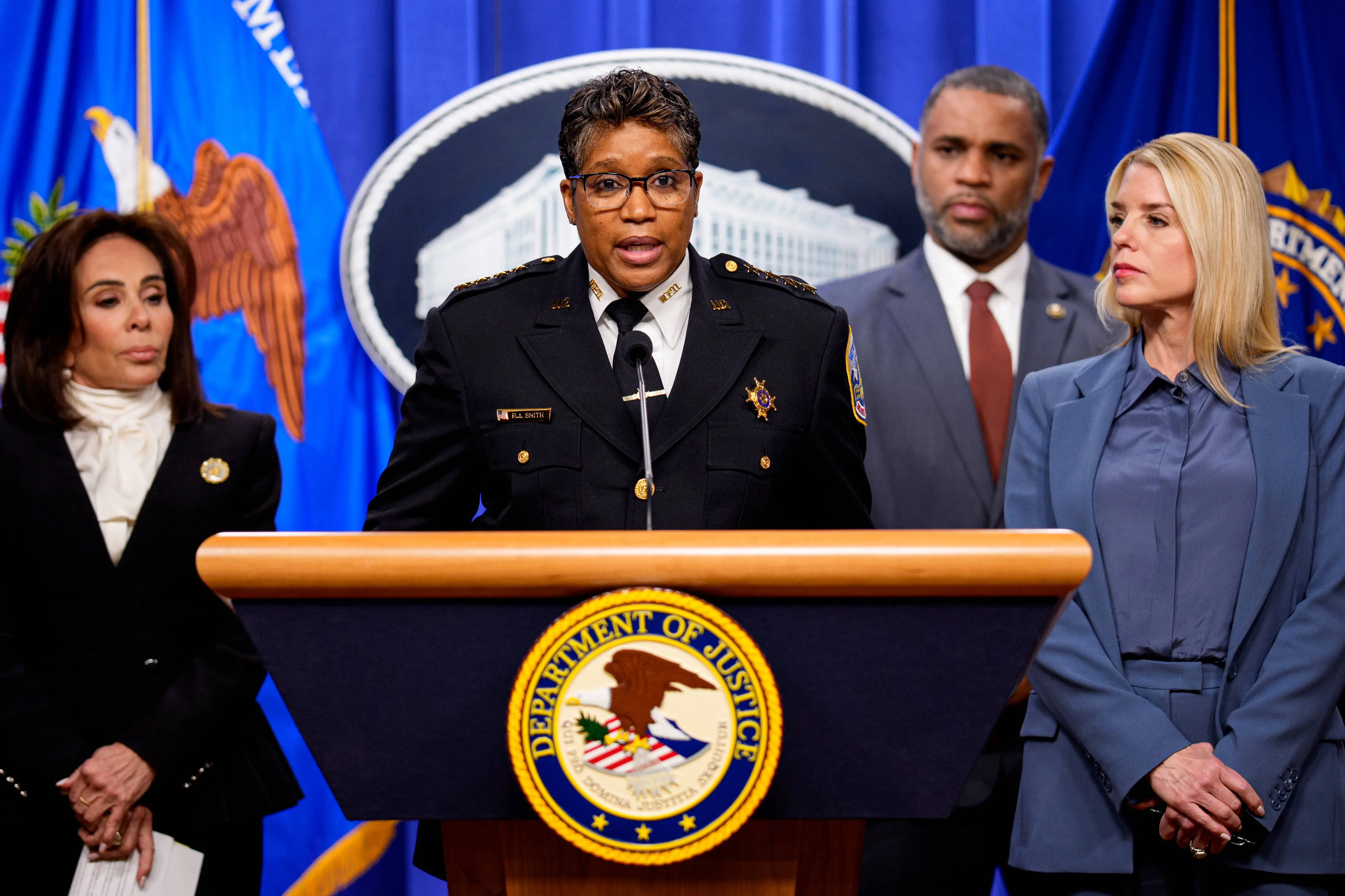 WASHINGTON, DC - DECEMBER 4: Metropolitan Police Department Chief of Police Pamela Smith, accompanied by (L-R) U.S. Attorney for the District of Columbia Jeanine Pirro, Firearms and Explosives (ATF) Washington Field Office Special Agent in Charge Anthony Spotswood, and Attorney General Pam Bondi, speaks during a news conference on an arrest of a suspect in the January 6th pipe bombing case at the Department of Justice on December 4, 2025 in Washington, DC. Federal agents have arrested a suspect they are charging with placing two pipe bombs, which never exploded, the night before the January 6th, 2021 U.S. Capitol attack. (Photo by Andrew Harnik/Getty Images)