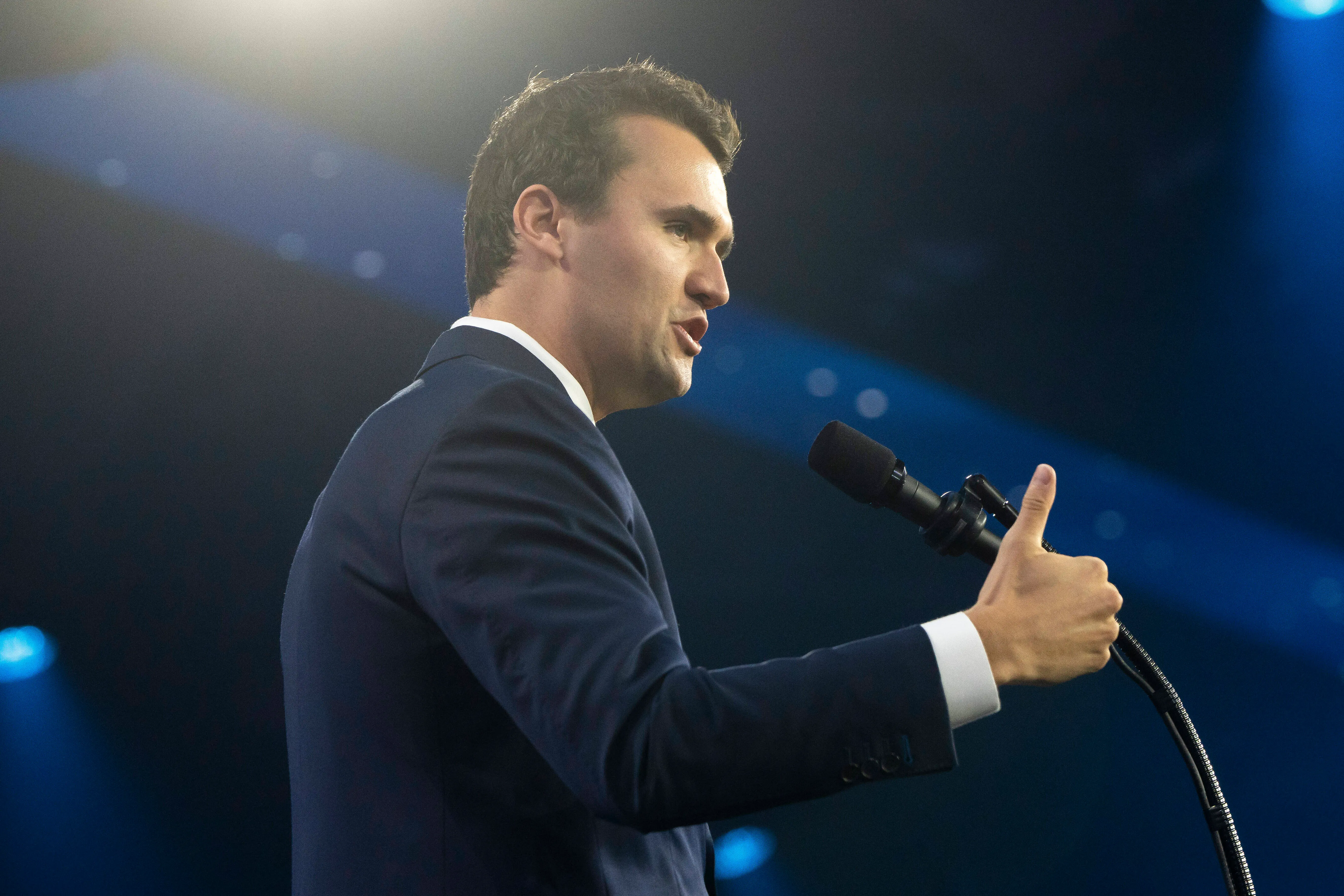Turning Point USA executive director Charlie Kirk speaks during Turning Point USA's AmericaFest at the Phoenix Convention Center (Image via Getty)