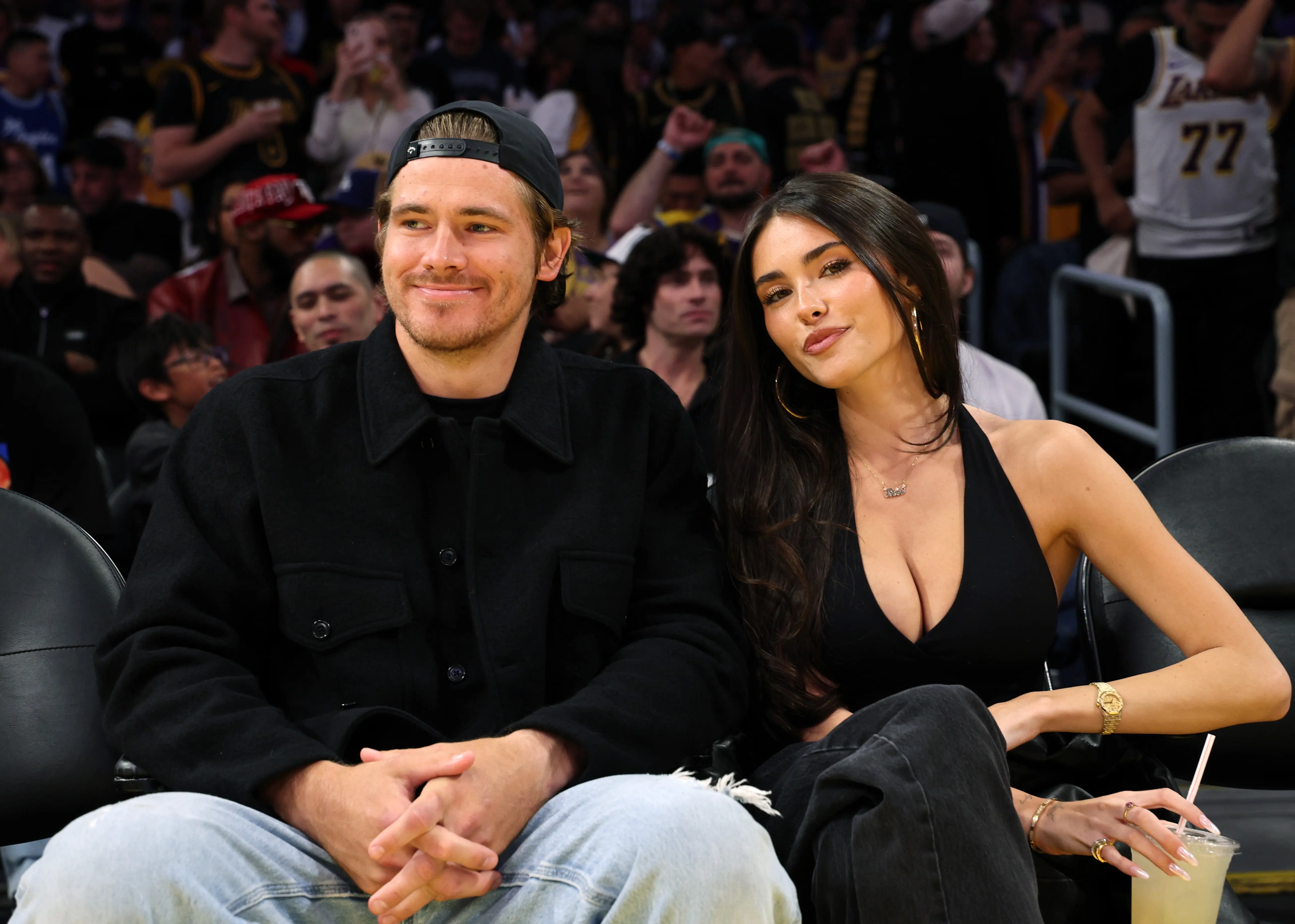 LOS ANGELES, CALIFORNIA - OCTOBER 24: Quarterback Justin Herbert #10 of the Los Angeles Chargers and Madison Beer attend a basketball game between Los Angeles Lakers and Minnesota Timberwolves at Crypto.com Arena on October 24, 2025 in Los Angeles, California. NOTE TO USER: User expressly acknowledges and agrees that, by downloading and/or using this Photograph, user is consenting to the terms and conditions of the Getty Images License Agreement.(Photo by Kevork Djansezian/Getty Images)